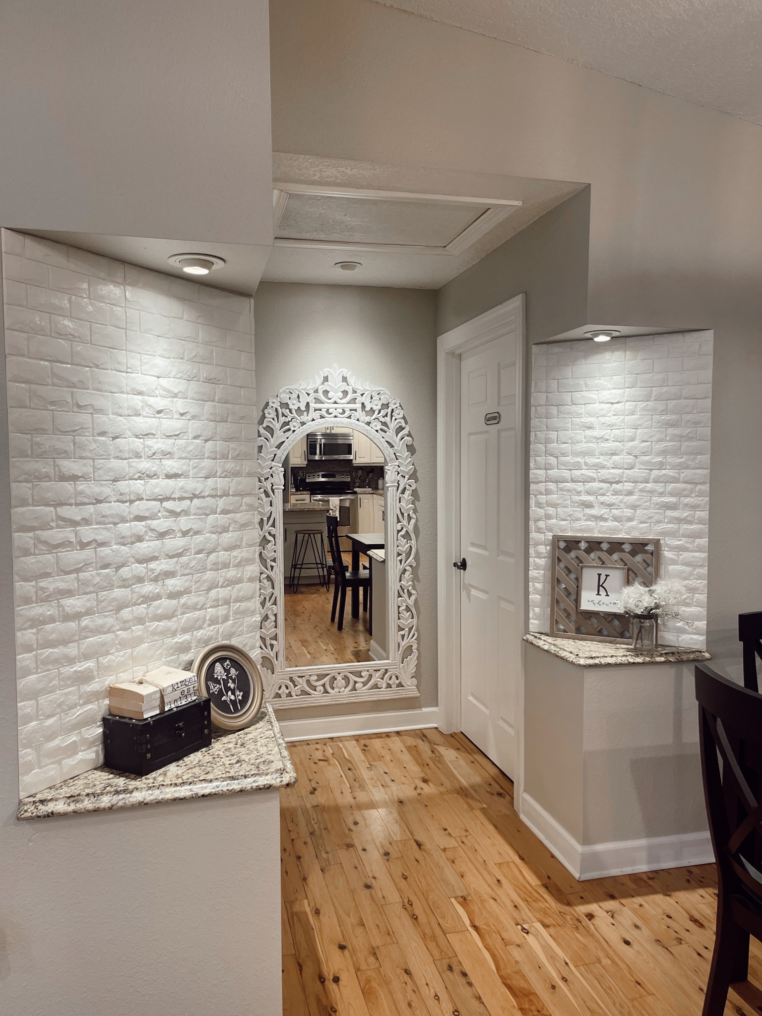 Super easy peel and stick white faux brick wallpaper panels! They have held up great in our little nooks over the past year and I’m extremely happy with them! They are from Amazon and under $50! Also linked large, vintage/antique style white mirrors similar to the one here; as well as the laundry room door sign!

#LTKsalealert #LTKhome #LTKfindsunder50