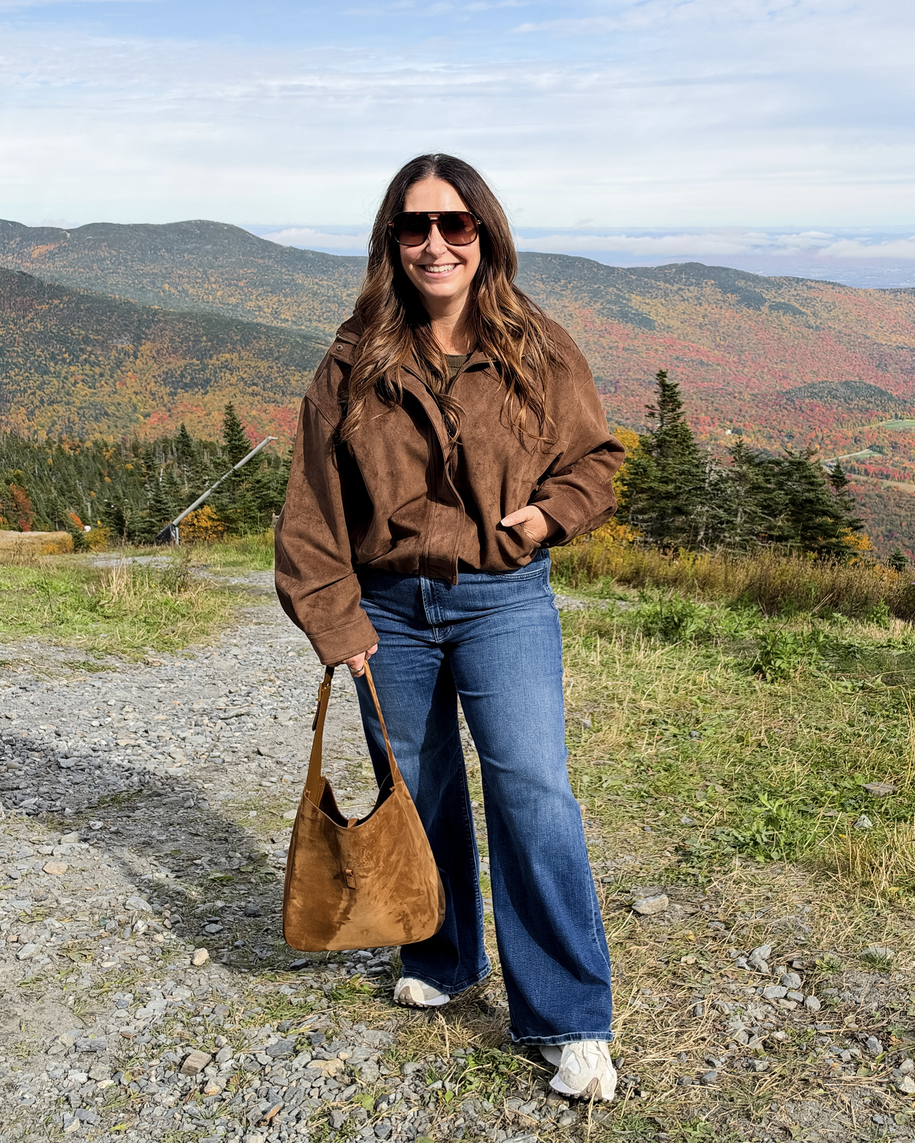 Brown suede bomber jacket over an olive top and wide-leg jeans was perfect for the top of the gondola ride in Stowe, VT 
 
Sizing: Jacket tts, L | Tee, L | Jeans, 34 @anthropologie

#LTKTravel #LTKOver40 #LTKMidsize #LTKSeasonal #LTKMidsize #LTKTravel
