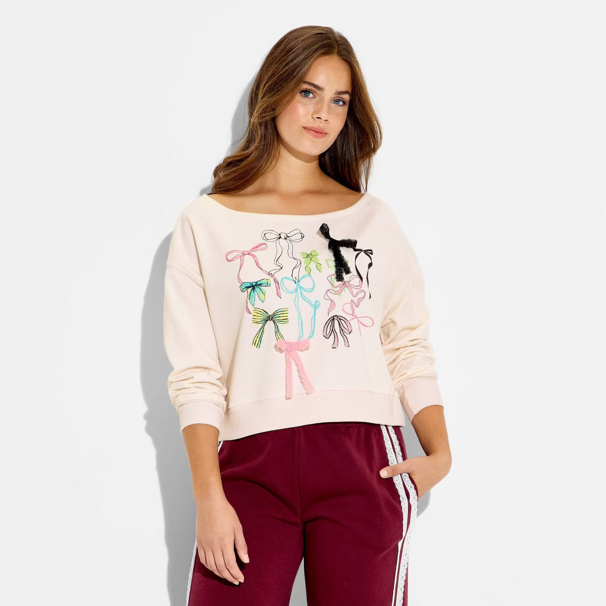 Women's Multi Bows Fleece Graphic Pullover Sweatshirt - Cream | Target