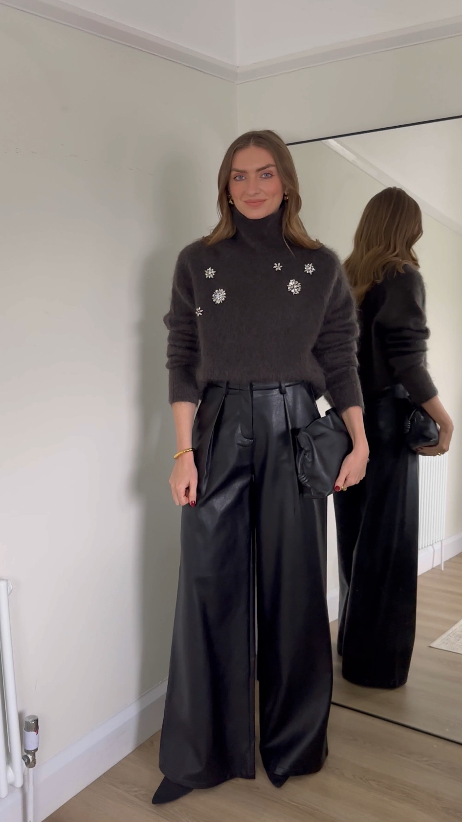 Christmas Jumper styling

Wearing a medium in the H&M dark grey mohair blend embellished jumper
A size 8 in the black faux leather wide leg trousers from Karen Millen, exact and similar linked. These also come in petite. I'm 5ft 6 for an idea of the length, I'm wearing the reg in these
Loewe mini flamenco black leather bag, exact & similar styles linked



Christmas Jumper outfit, Christmas day outfit, festive fashion, winter outfit, leather trousers outfit, evening outfit 

#LTKwinter #LTKeurope #LTKuk