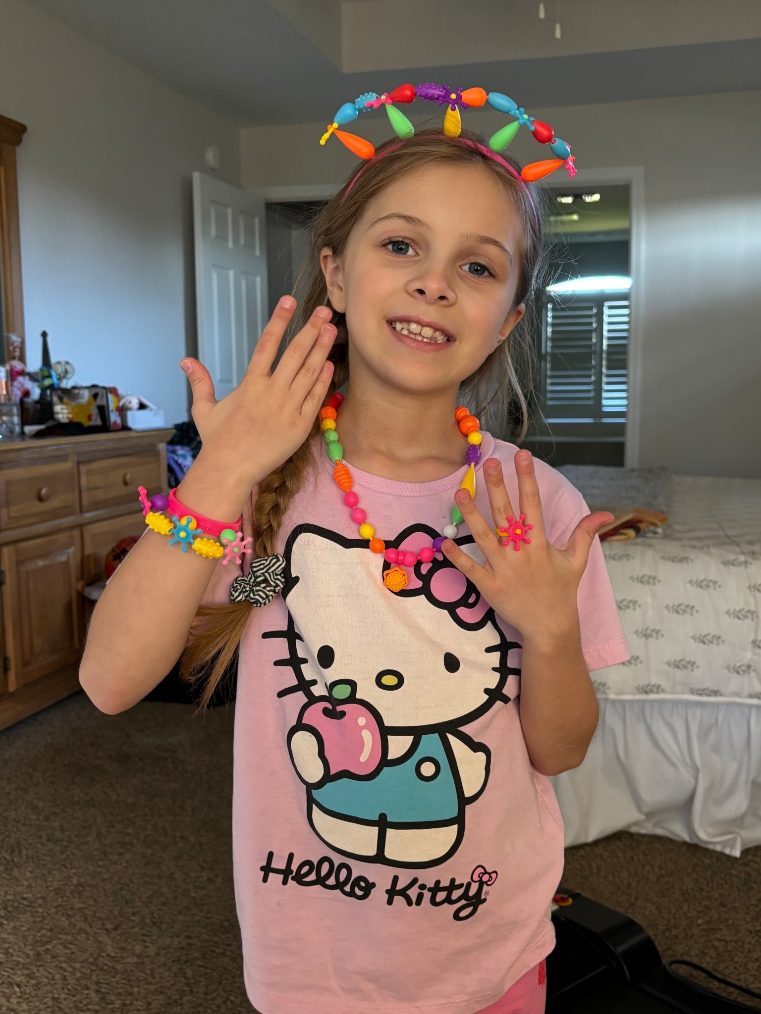Hollys pop bead jewelry she made! Shes 8 and LOVES this kids activity and craft! It’s so much fun and would be super exciting to play with a group of kids. Build again and again. Kids jewelry, kids accorded, kids craft, kids game, affordable kids Christmas gift idea 

#LTKKids #LTKFamily #LTKGiftGuide