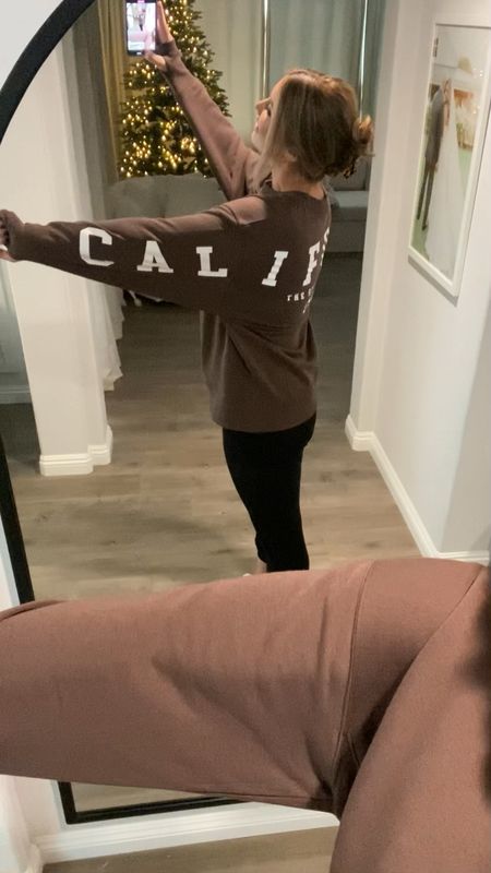 This CALIFORNIA sweatshirt tho! It is so soft and cozy too 😍 I’m in head to toe #Target & it’s all 30% off today! 🥳 Cozy super soft joggers and slippers. The perfect outfit for chilling at home and would make a great gift for her! For an oversized look, size down one in the sweatshirt. Joggers run slightly large! 

#targetfashion #giftforher #giftsforher #loungewear #giftguide

#LTKfindsunder50 #LTKGiftGuide #LTKsalealert
