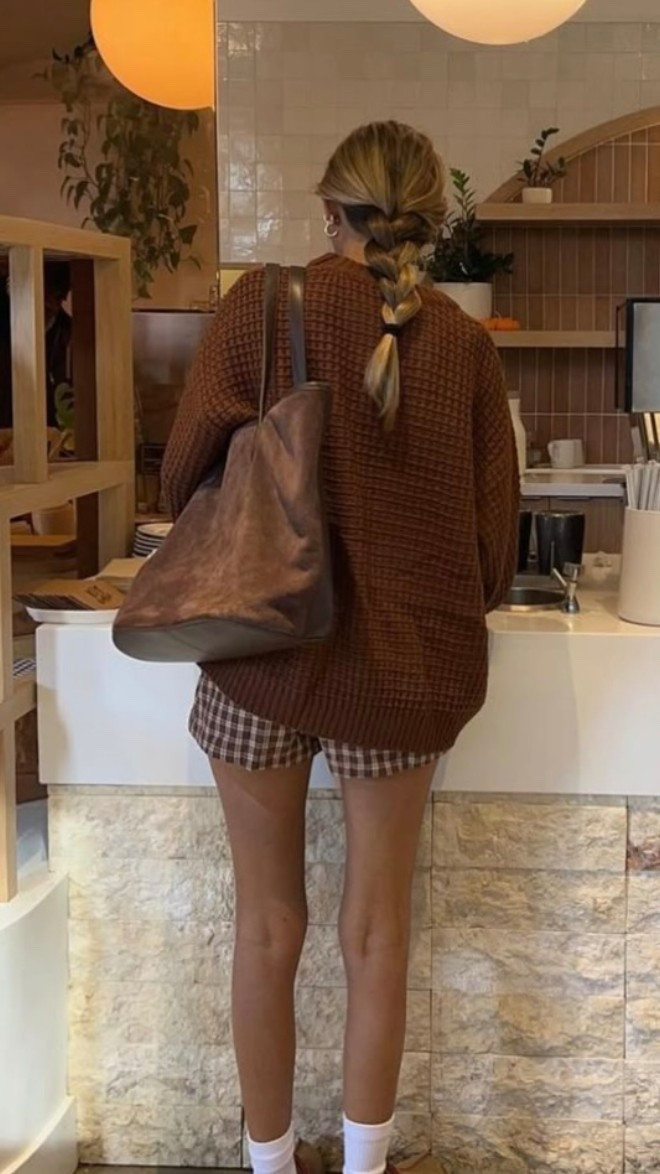 Cozy fall vibes 🍂 Brown gingham shorts, UGG slippers & a chunky knit for the ultimate comfy chic look. Fall outfit inspo for running errands or lounging in style — shop the trend on LTK! #falloutfit #uggseason #ginghamshorts #cozyfallstyle #ltkfall #fallfashion2025 #ltkoutfit #trendystyle