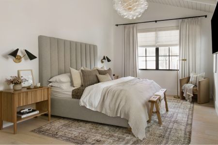 Bedroom reveal
Upholstered bed, glass chandelier, brass chandelier, neutral rug, Moody rug, noodle bench, vintage, bench, 
accent chair, curved chair, pillows would nightstand