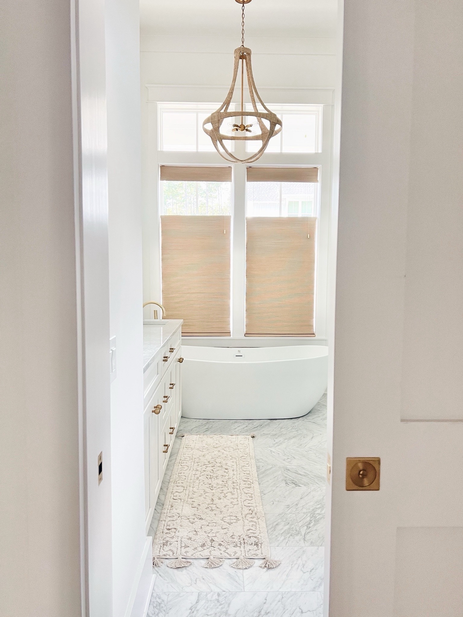 Washable bath mat. These are such great quality. This one (the 34”) is sold out but the 58” is in stock! I do top down woven wood shades in my bathroom in capri ivory.

#LTKHome #LTKStyleTip