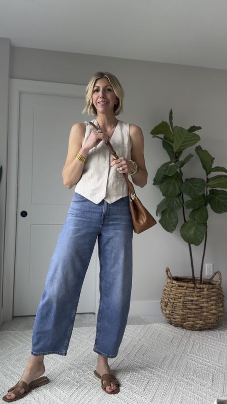 Easy elevated jeans outfit for spring! Try swapping out your basic tee or tank for a linen vest! 

Wearing a size 4 in the vest & my tts 27 tall in the jeans - I’m 5’10” for height reference



#LTKVideo #LTKxMadewell #LTKOver40