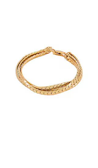 Jenny Bird Priya Layered Bracelet in Metallic Gold. | Revolve Clothing (Global)
