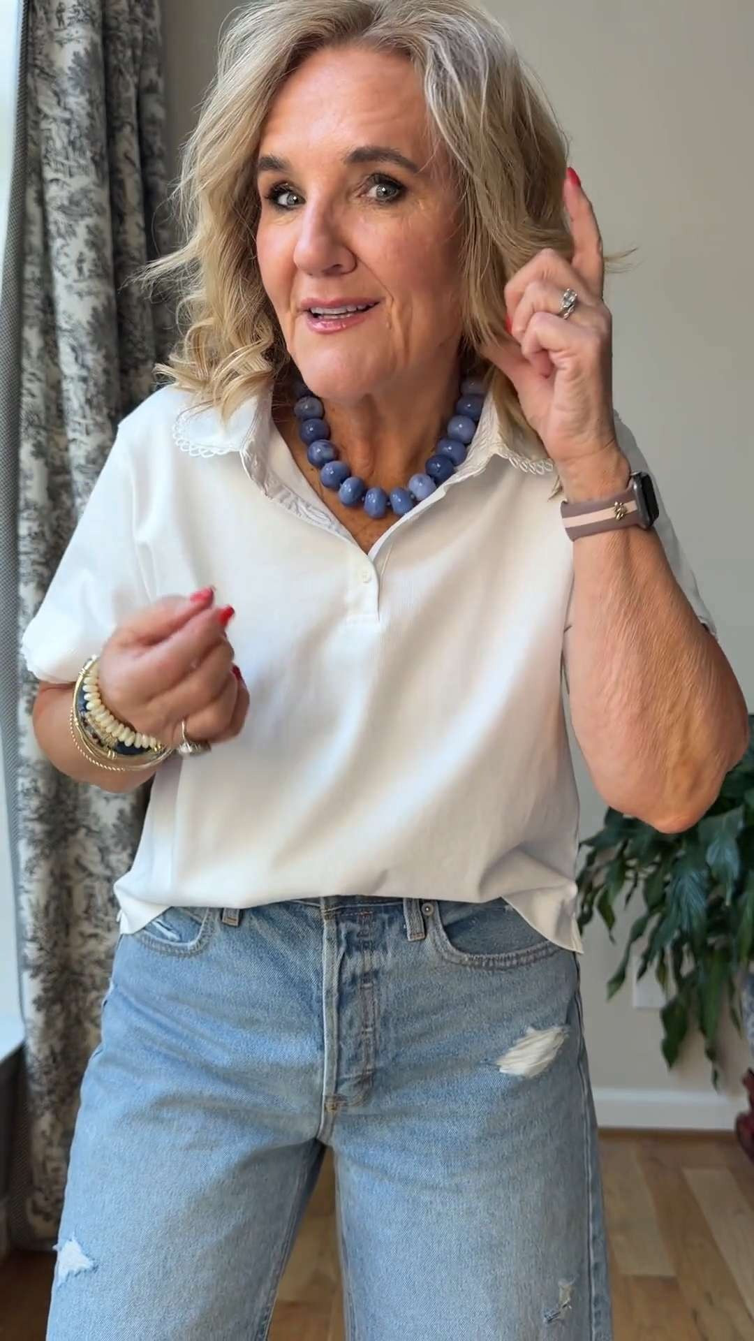 Found the cutest casual summer outfit 🫶🏻 This white polo has the prettiest lace-trim double collar detail and feels so soft and elevated for everyday wear. Paired with relaxed Bermuda denim shorts, woven Mary Jane flats, layered bracelets, and a straw tote for an easy look you can wear all season long. 

 #LTKootd #LTKSeasonal #LTKOver40