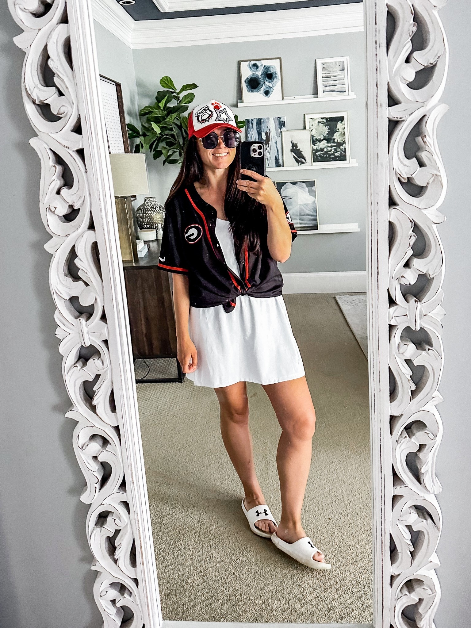 Got a ball game to attend?  This little sports dress is PERFECT for style in warm weather!  I tied our teams jersey over the top and boom - instantly felt stylish and still comfortable.  Has shorts that pull down for bathroom access and pockets!  I’m 5’7” and 165 lbs and wearing the large.  

#LTKActive #LTKFindsUnder50 #LTKMidsize