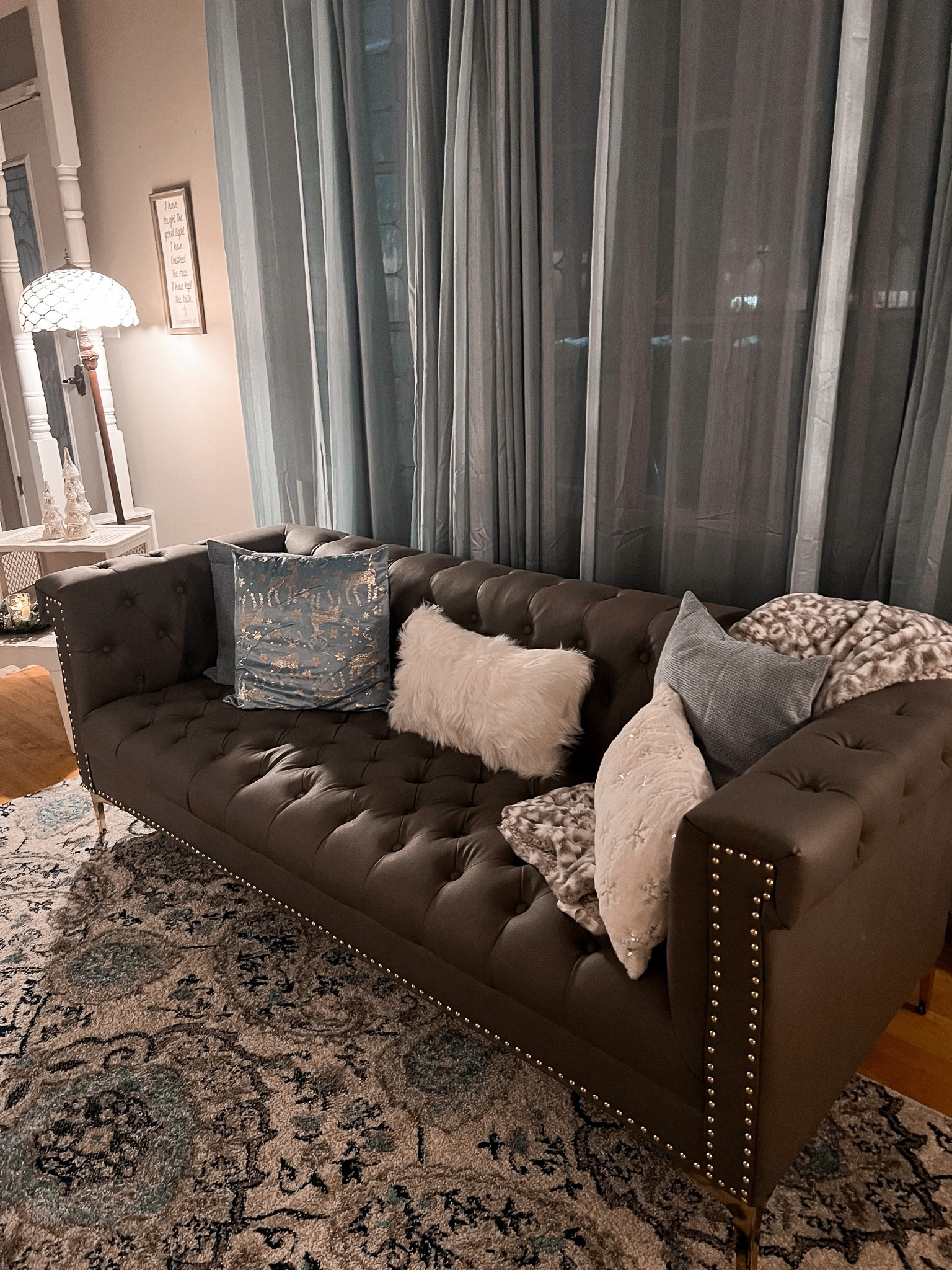 Loving my new couch and its Christmas pillows - tufted couch  - tufted sofa - Chesterfield couch - Chesterfield sofa - holiday pillow covers - throw pillows - area rug - Tiffany floor lamp 

#LTKunder50 #LTKhome #LTKHoliday