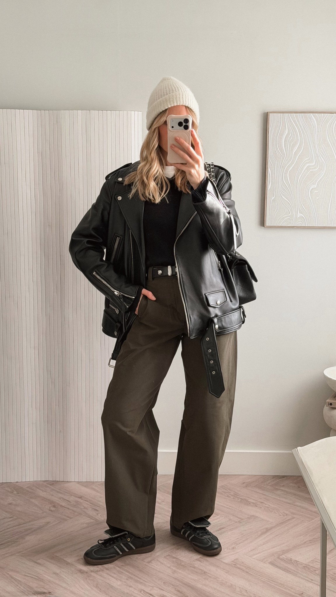 Weekend outfit styling the Uniqlo jersey barrel leg trousers in khaki green that are £35 - I’m wearing the long version and have a 31 inch leg.

Styled with a John Lewis men’s v neck cotton black sweater I got on sale under £20, layered over a t-shirt with my Arket stud belt (I’ve found a great alternative at M&S for the khaite look)

Finished with my new samba trainers, a Sezane bobble hat and an old acne studios padded leather jacket (linked similar in the MyTheresa Sale)

#winterstyle #uniqlo 

#LTKwinter #LTKuk #LTKshoes