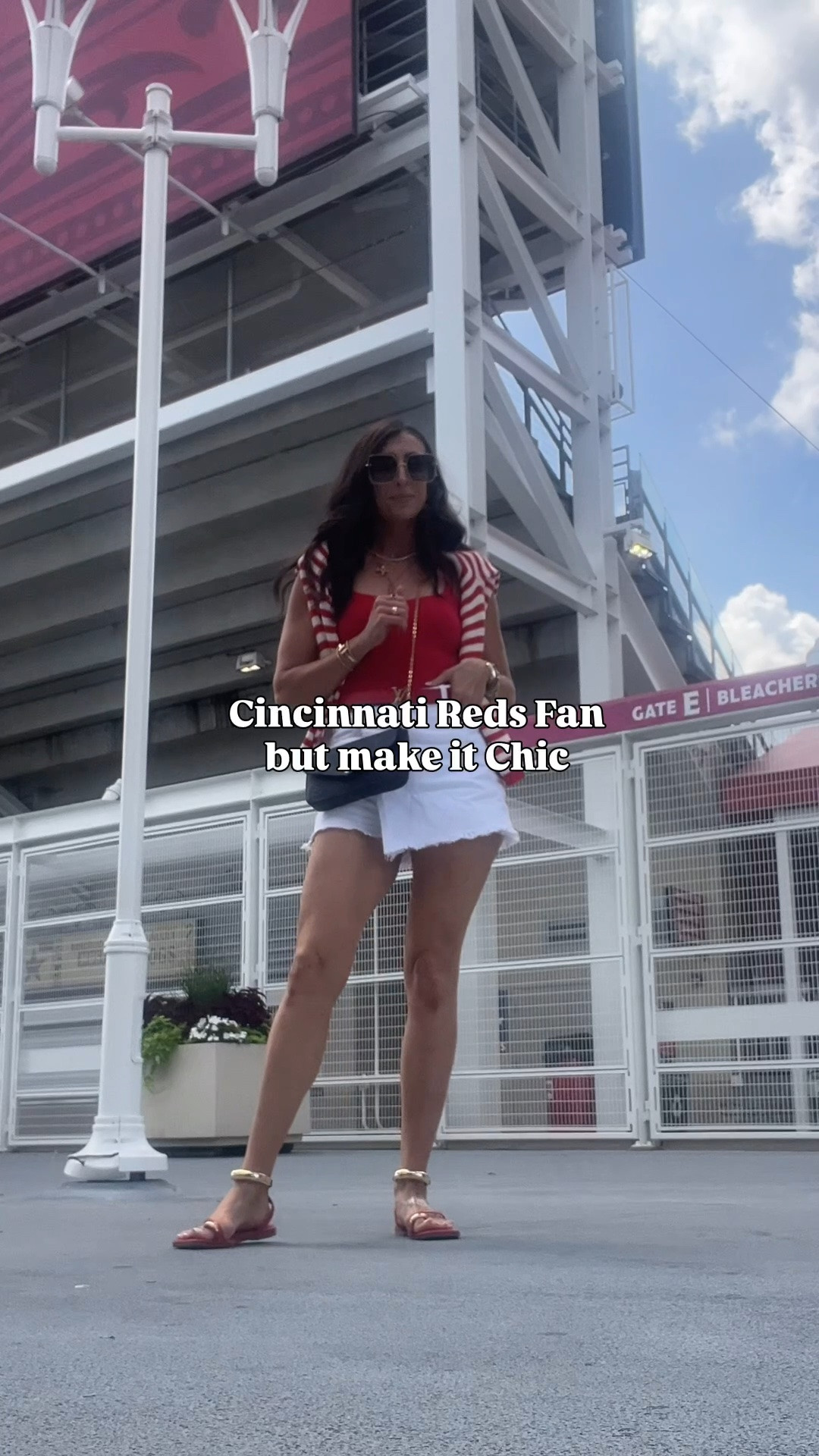 The @reds may not have won today, but my ‘fit was on point to cheer on the Redlegs

Outfit breakdown:
Tank: Amazon
Skort: Zara
Sandals: Amazon
Sweater: @target (last year)
Sunglasses, Bag & Belt: Louis Vuitton 
Sticky Bra: Boombas