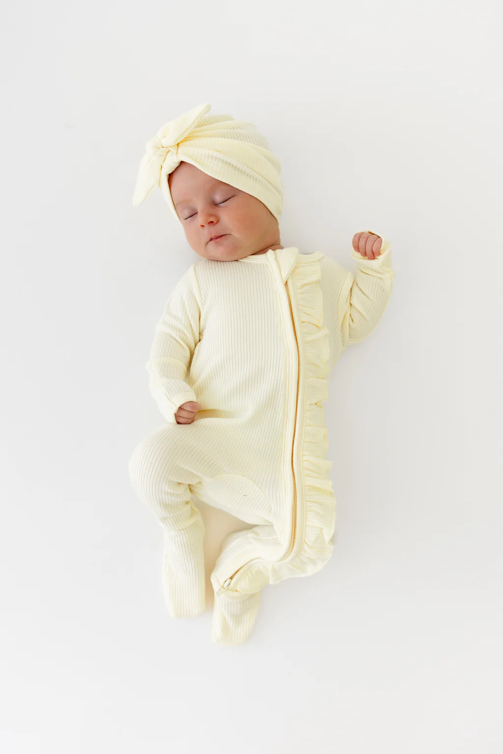 Ribbed Ruffle Zipper Footie in Chamomile | Kyte Baby
