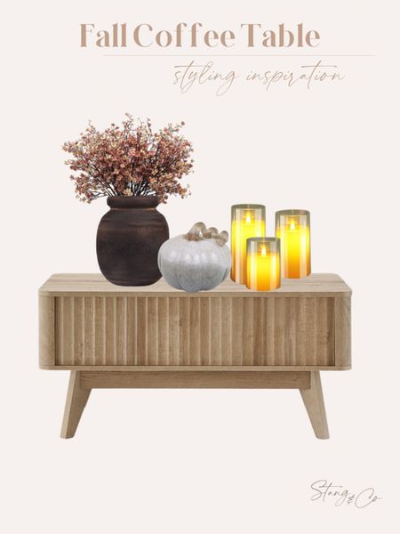 Fall coffee table inspiration! This light wood coffee table looks great with a black wood vase filled with Fall colored stems, a decorative pumpkin, and amber led candles. 

Fall decor, fall decorations, coffee table style, fall home

#LTKstyletip #LTKunder50 #LTKhome