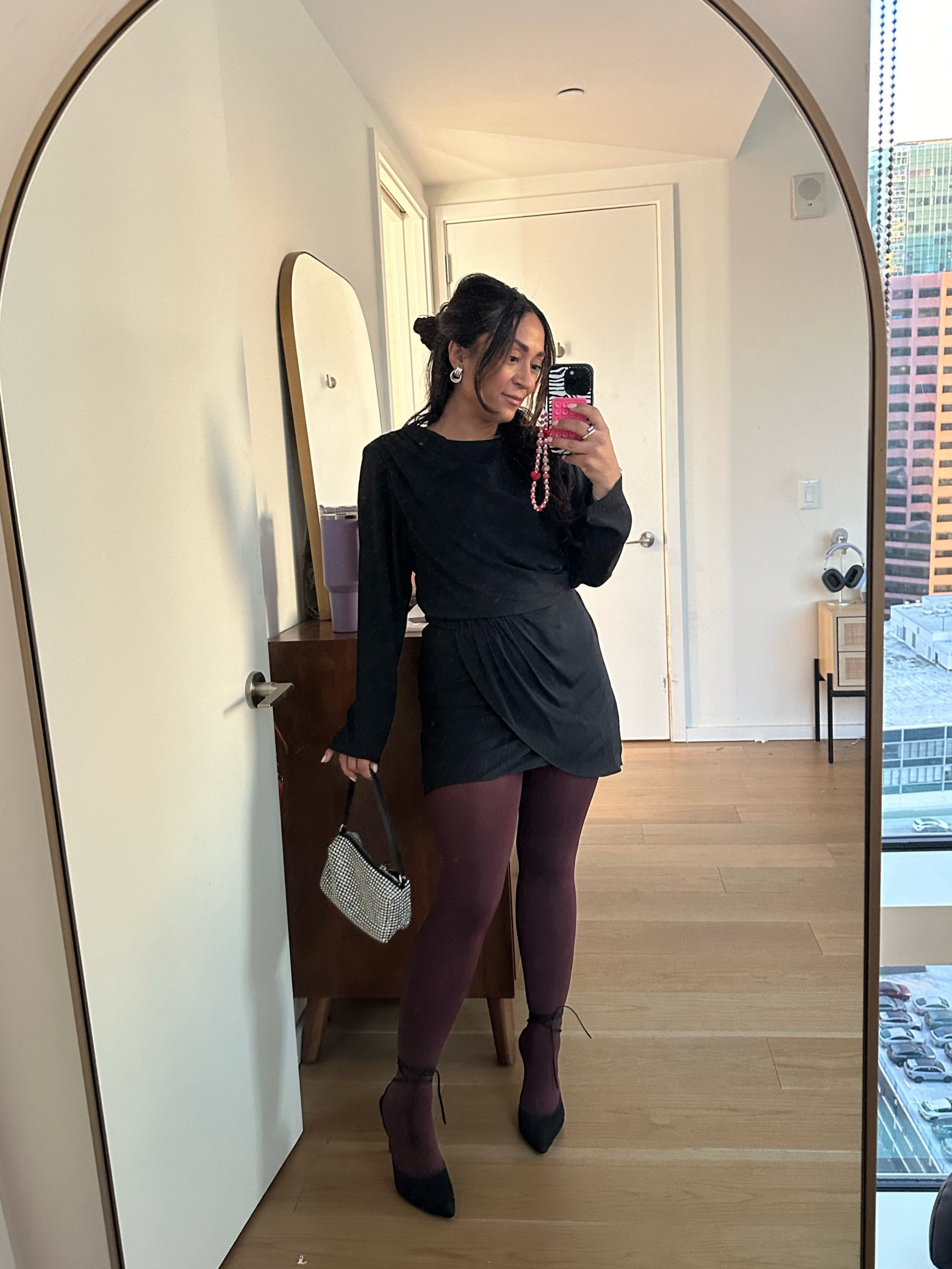 Black mini dress with red/burgundy tights 

#LTKover40 #LTKstyletip #LTKHoliday