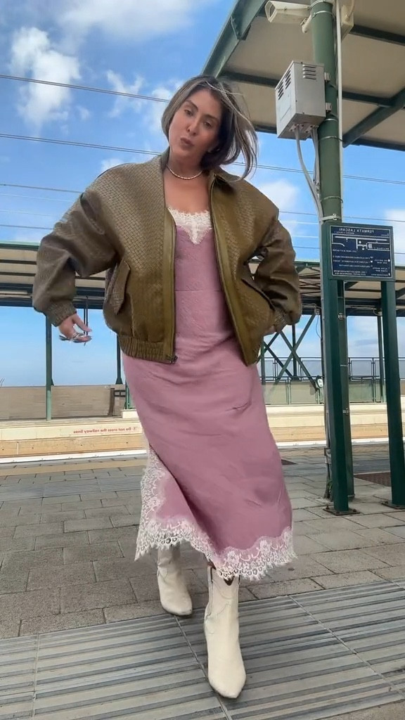 gap slip dress
lioness bomber jacket
Khaite look boots 