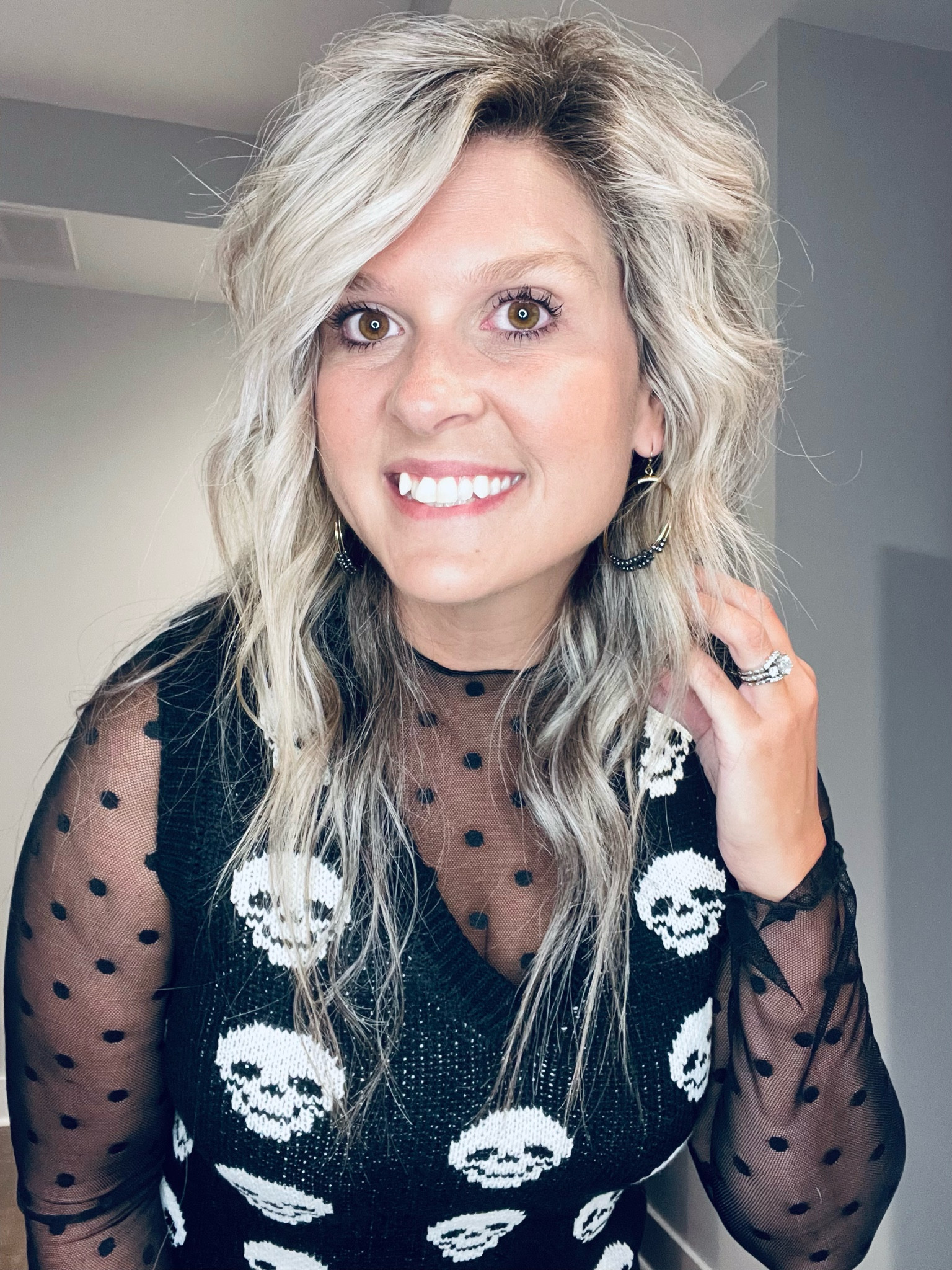 who doesn’t love a good sweater vest?!? and look how cute it is paired with a polka dot mesh top 🖤🤍 

&& y’all my adorable Kinsley Armelle earrings are 20% off with code FALL20 🖤🤍

#LTKHalloween #LTKsalealert #LTKstyletip
