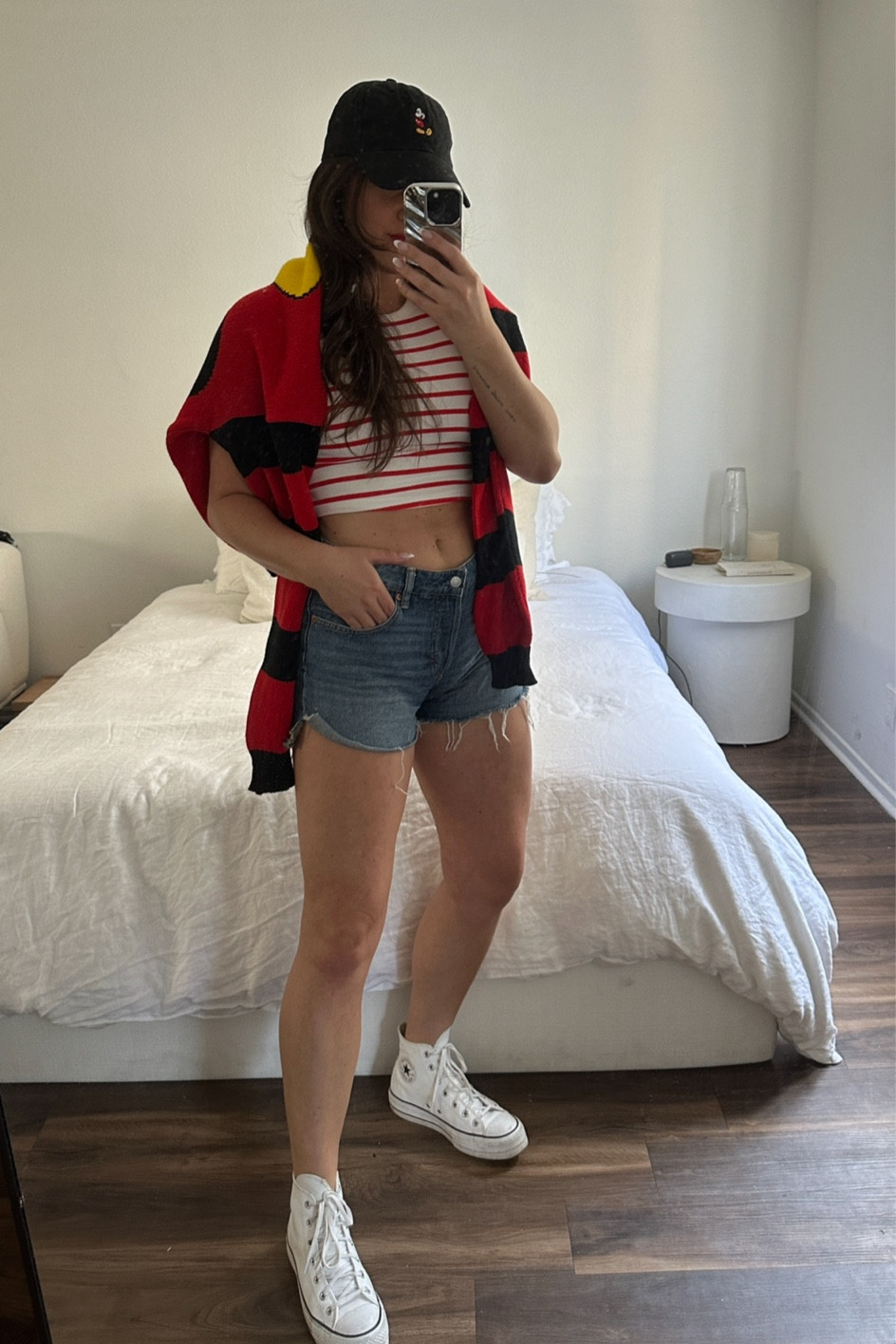 Disney Outfit Idea Seven: H&M tank top, H&M jean shorts, vintage Minnie Mouse sweater, white platform leather converse, Amazon Mickey Mouse hat.

#LTKunder100 #LTKstyletip #LTKtravel