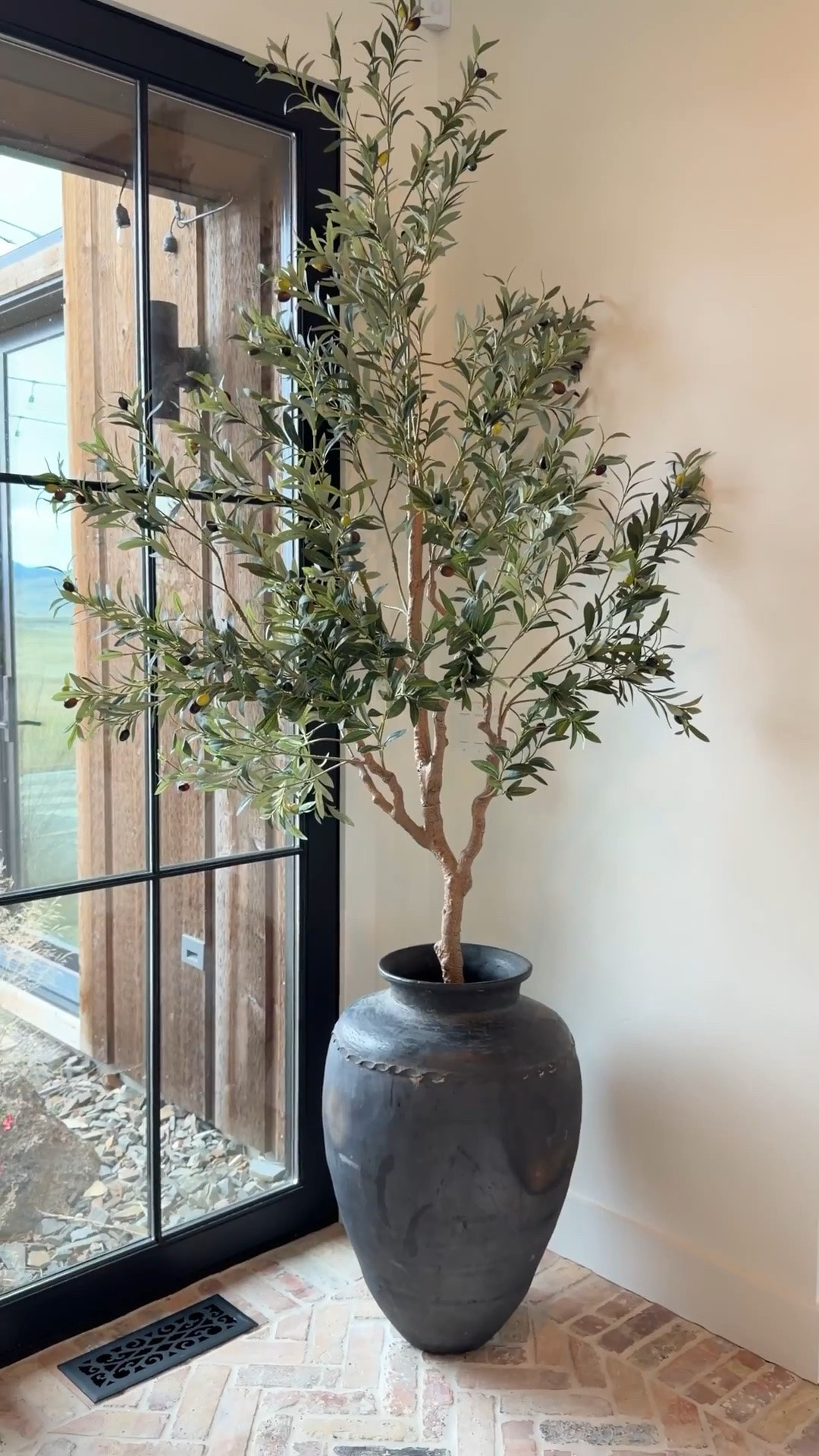 I never realized how much one piece of greenery could change a room until I finally added a faux olive tree. It brings height, softens empty corners, and gives the whole space that finished, lived-in feel.

Now it's one of my favorite styling tricks whenever a room needs just a little something extra.

#LTKHome #LTKmomlife #LTKvlog