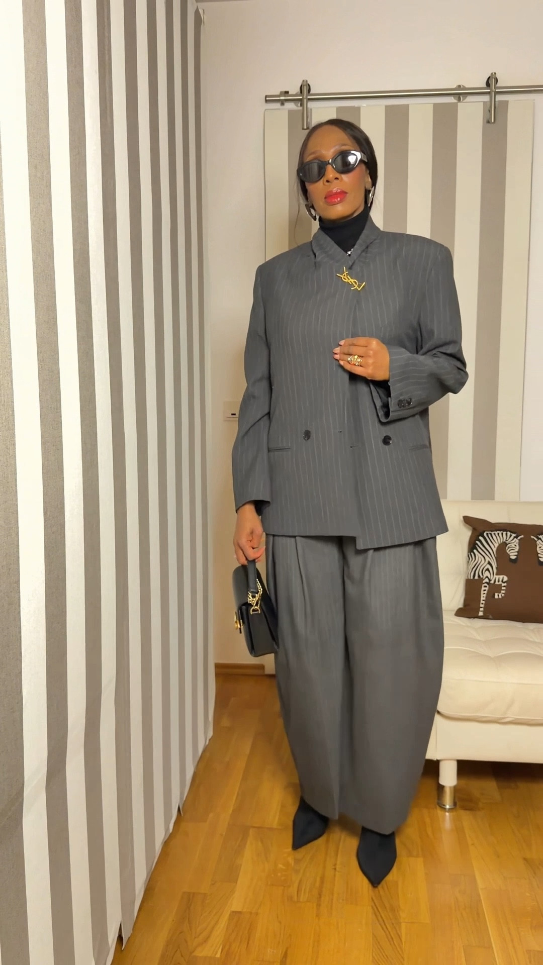 How to make a suit look different without making your life more complicated.
Add a brooch

#LTKstyletip #LTKworkwear #LTKover50style