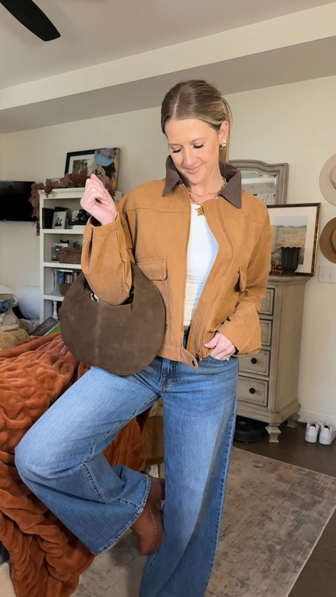 The Barn Jacket has quickly won me over! It’s soooo cute! And goes with anything! Dress it up, dress it down…faux suede with a soft fleece lining. Light-weight making it perfect for Fall transition and for layering in the winter. Pockets, button sleeve, & the cutest cropped, boxy fit. 
I got a Medium in the darker brown and my normal size small in the light tan. Not much of a difference and I love them both. 
This one is affordable and will be your new favorite jacket! 

Suede coat | vegan leather | faux suede | jacket | Barn Jacket | cropped jacket | Cropped barn jacket | Amazon find | Fall find | Trending 

#LTKFindsUnder50 #LTKU #LTKSeasonal