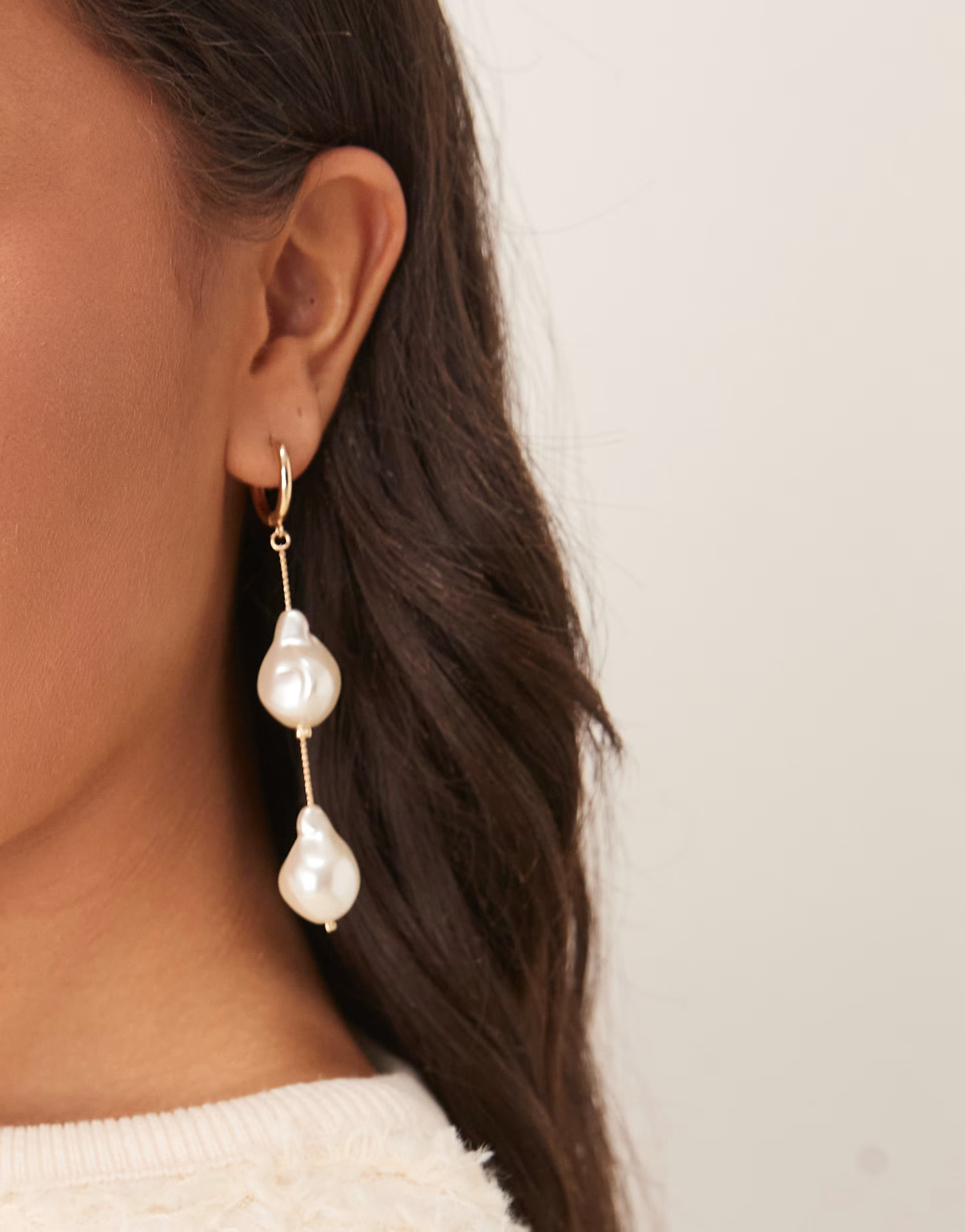 ASOS DESIGN drop hoop earrings with faux freshwater pearl drops in gold tone | ASOS (Global)