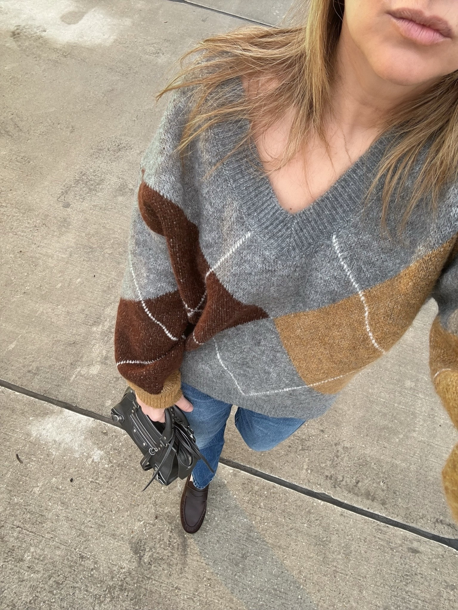 Fall outfit: oversized v-neck argyle sweater in neutral colors with straight leg jeans and burgundy loafers

#LTKSeasonal #LTKWorkwear #LTKootd