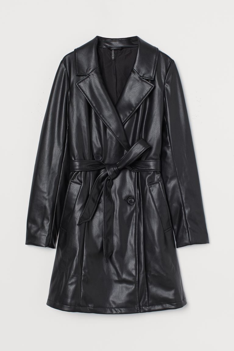 Short, double-breasted trenchcoat in faux leather. Notched lapels, soft, removable tie belt at wa... | H&M (US)