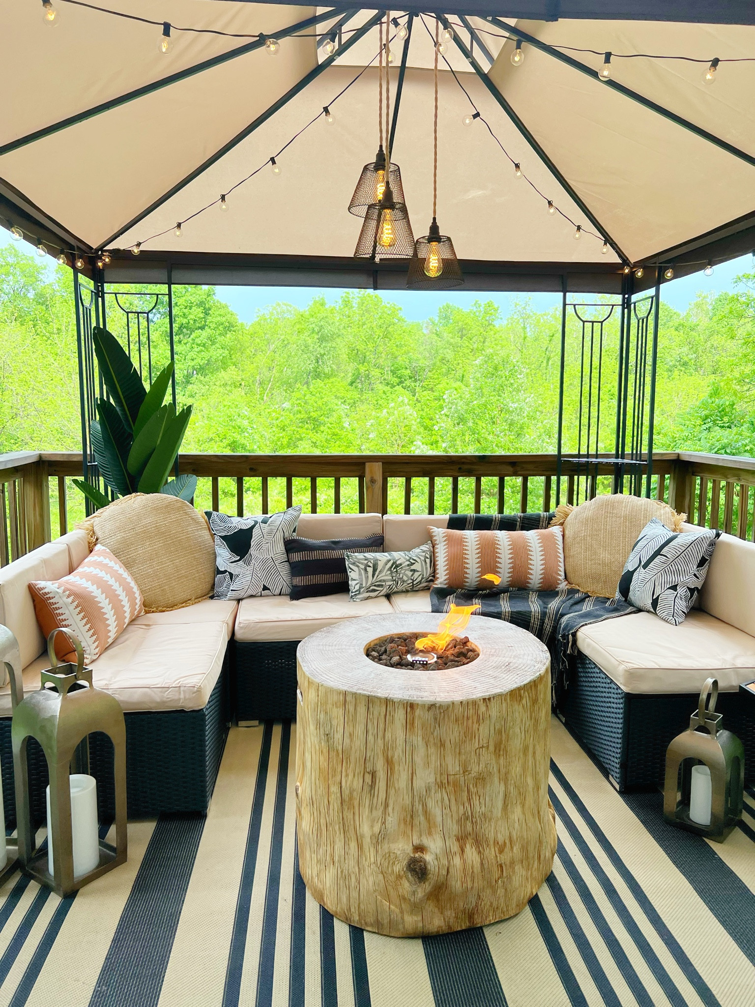 Back deck. Patio furniture. Fire pit. Outdoor sectional. String lights. Outdoor lantern  

#LTKfamily #LTKSeasonal #LTKhome