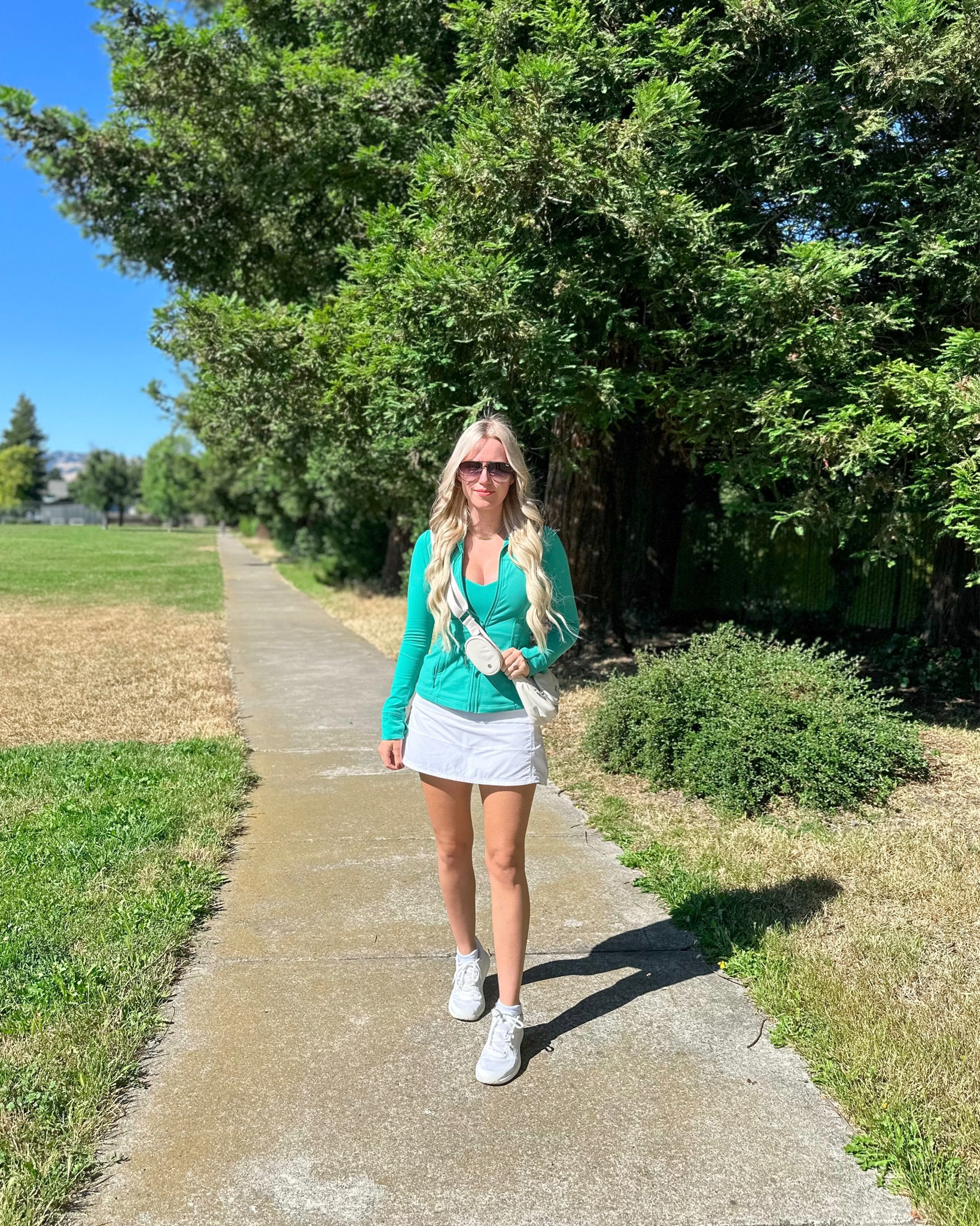 Jacket: Maldives Green, 6
Tank: Maldives Green, 8
Skirt: White, 4
Sneakers: White, 4

#LTKSeasonal #LTKFitness