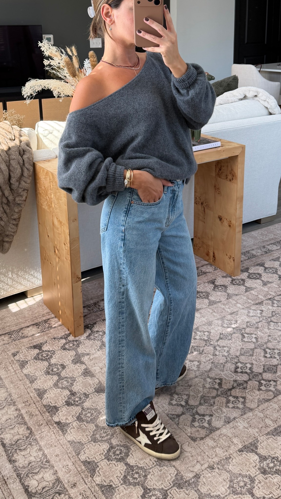 Have worn this sweater so many ways! Size small and 24 short jeans!