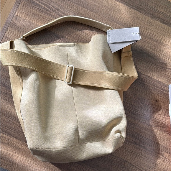 Rothy's Cream Bucket Bag with Slouchy Design | Poshmark