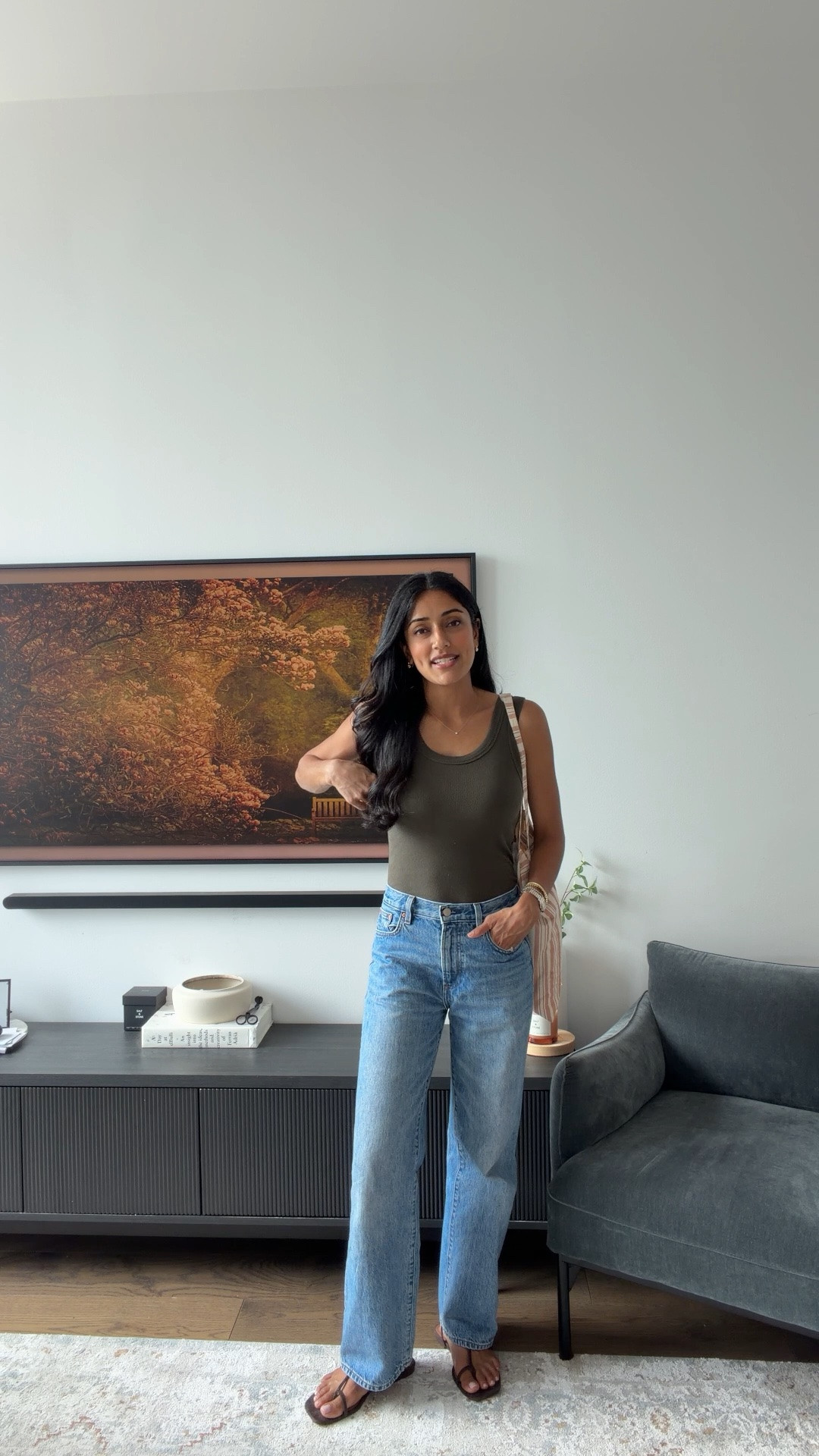 What to wear when you don’t know what to wear @Aritzia I’m wearing a size small in this tank (this exact color is sold out) and a size 25 in these jeans. I am 5’4 for reference