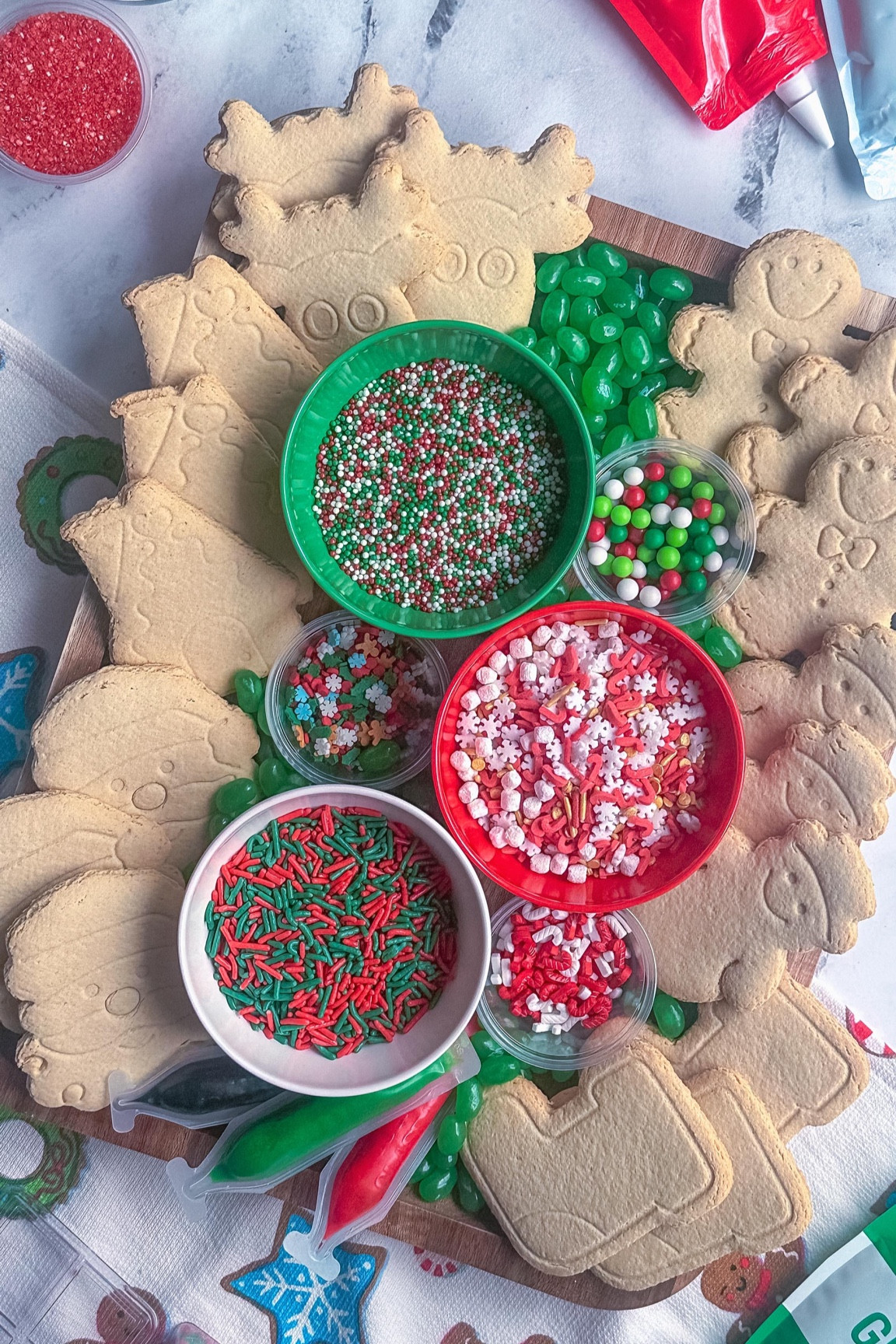 Day 9: Cookie Decorating Board!

Get in the holiday spirit with a DIY cookie decorating board. Whether you bake your own cookies or grab some premade ones, this festive setup is perfect for a fun activity or a creative dessert option. 🍪

Here’s what to include:

• Cookies: Sugar cookies, gingerbread, or your favorite shape!
• Decorations: Icing in piping bags, sprinkles, mini candies, and edible glitter.
• Extras: Small bowls of powdered sugar or cocoa for dusting and festive tools like mini spatulas or spreaders. 
Pro tip: Group your toppings by color or theme.

#fyp #charcuterieandthings #charcuterieboard #cheeseboard #foodstyling #diy
#cookiedecorating #holidayboards #holidayfun #christmas

#LTKParties #LTKSeasonal #LTKHoliday