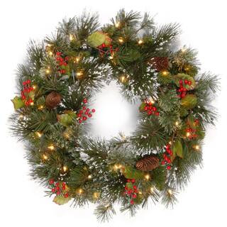 24 in. Wintry Pine Artificial Wreath with Clear Lights | The Home Depot