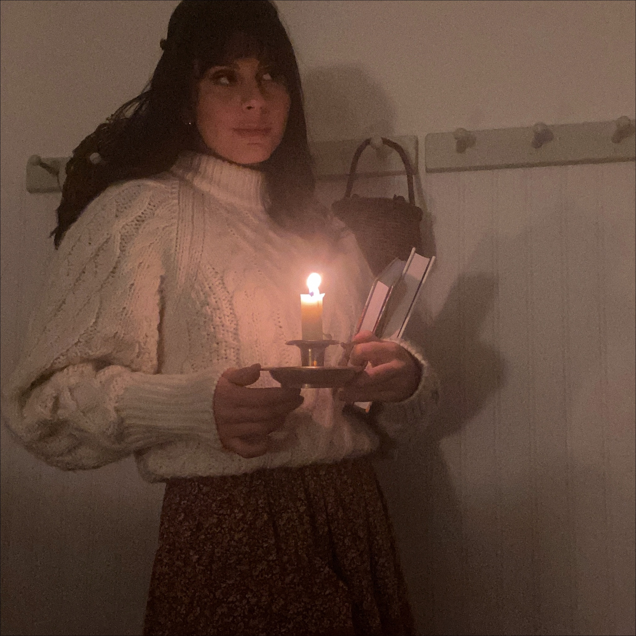 Reading by candle light in a cozy knit 🤍

#LTKstyletip #LTKhome