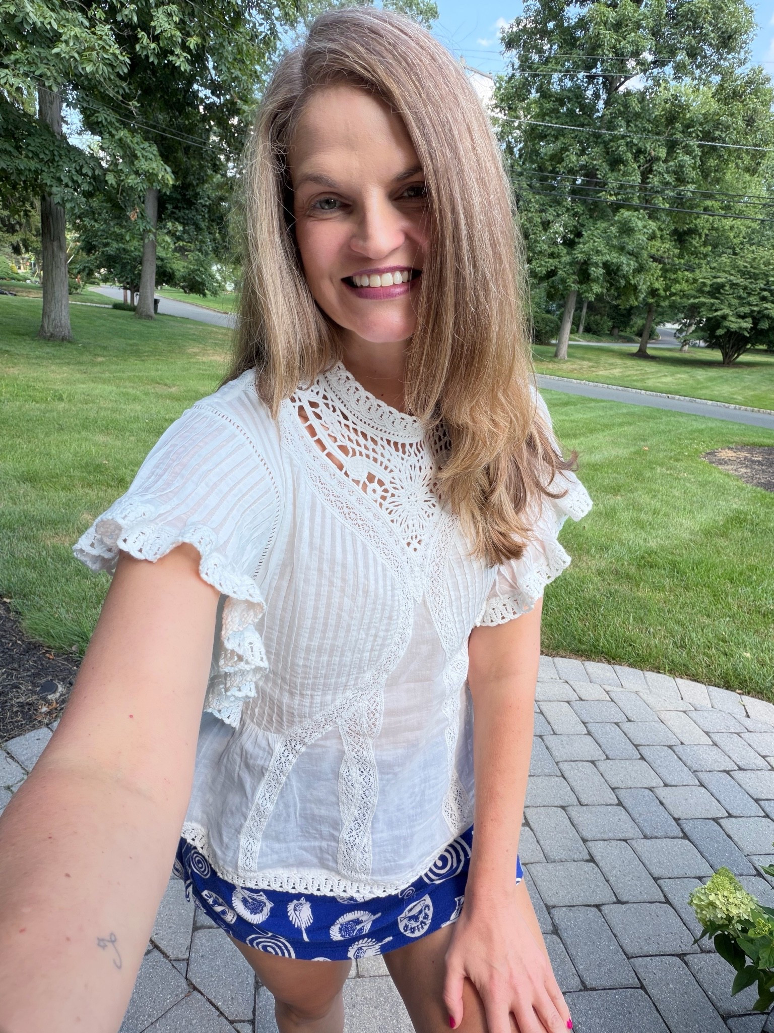 Summertime vibes — crisp bright work attire on top, fun vibrant mini skort Oofos thongs on my feet!

#LTKdayinmylife #LTKWorkwear #LTKootd