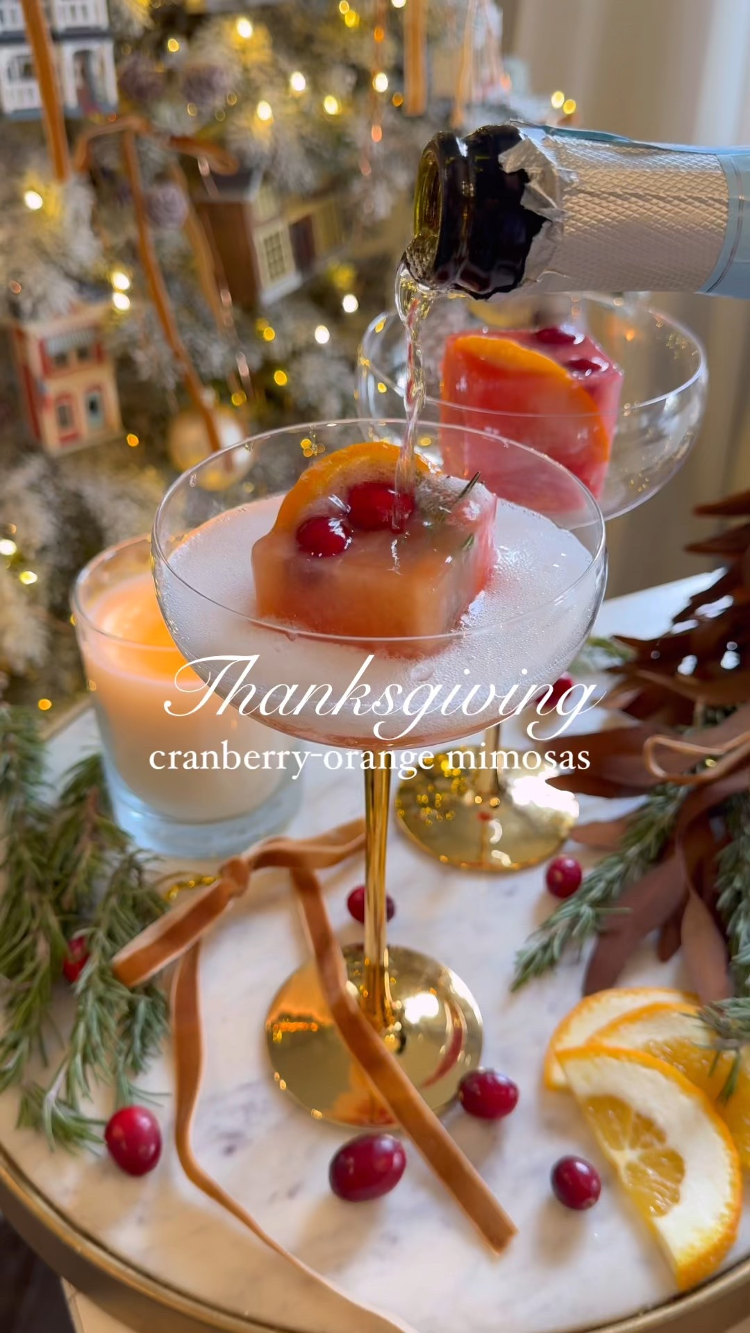 Thanksgiving Cranberry-Orange Mimosas 🍊are the perfect light cocktail to sip on while cooking Thanksgiving dinner. 

Prep the juice ice cubes ahead for the EASIEST holiday drink you can possibly make. Here’s how I make mine…
🍊

Thanksgiving Mimosas
🦃🍊
Makes 8 large square ice cubes, (you can easily make more)

1 cup cranberry juice cocktail 
1 cup orange juice
1 orange sliced
fresh cranberries, 2 per cube
sprig of fresh rosemary cut into small pieces
1 bottle chilled champagne or Prosecco
🍊
1. Add orange slides, cranberries and rosemary to ice cubes ahead molds. 
2. Freeze overnight. 
3. Place an ice cube I each glass and top with champagne or Prosecco. Enjoy!

#thanksgivingdinner #thanksgivingprep #thanksgivingcocktail #thanksgivingdrinks 

#LTKHoliday #LTKfoodie #LTKHome