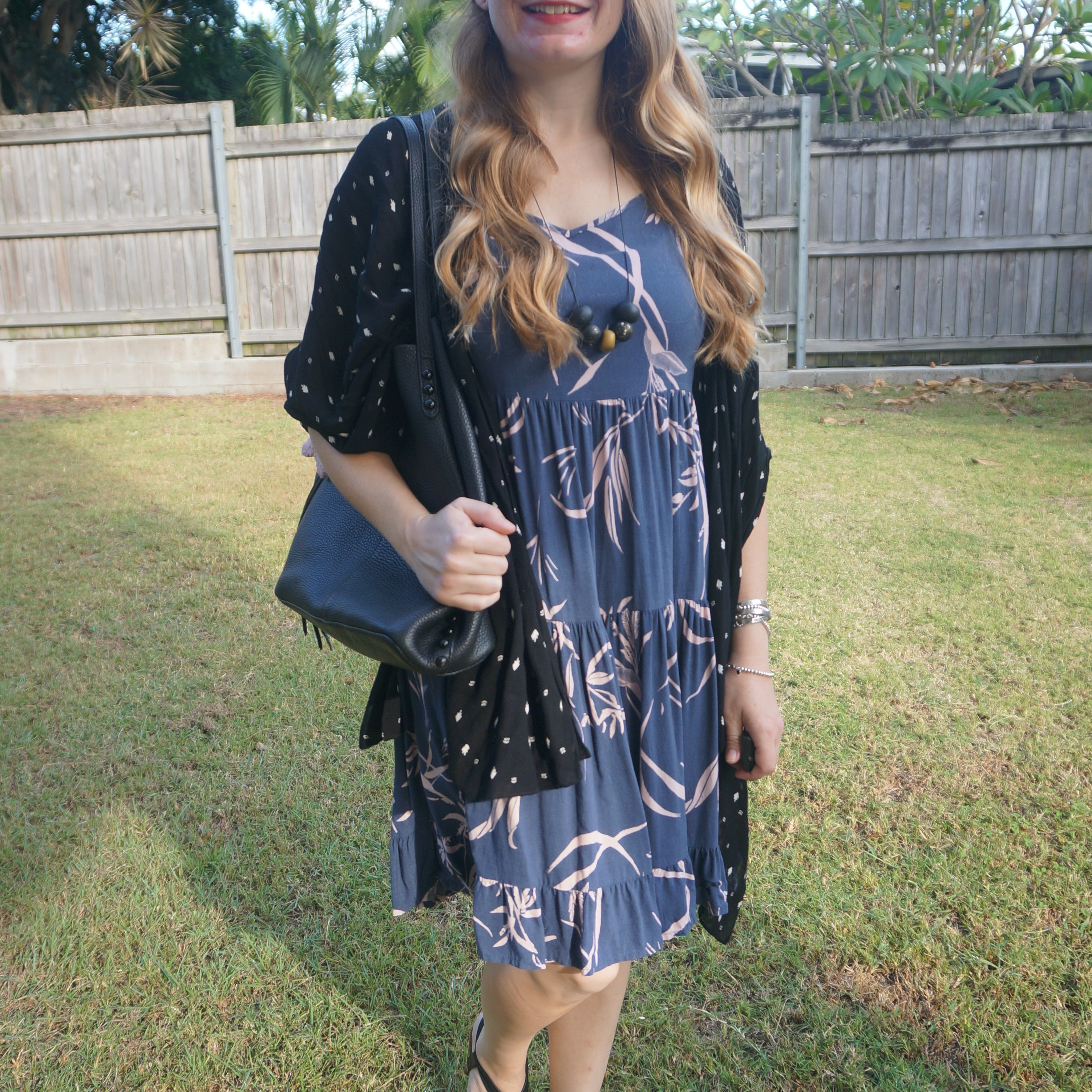 Kmart Anko tiered blue sundress with black cover up and Rebecca Minkoff medium unlined studded tote bag 🖤

#LTKaustralia #LTKautumn #LTKbag
