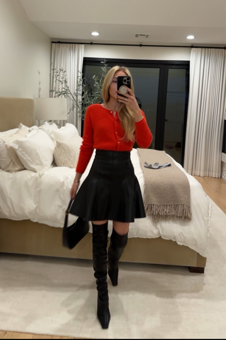 Heading to an event tonight wearing one of my favorite looks to date! This red Sezane knit is adorable and gives me Emily in Paris vibes 🌹 I tucked it into this faux leather black Norma Kamala skirt and over the knee black boots by Proenza Schouler (splurge but worth it). They’re incredible comfortable!

I searched for some very similar faux leather skirts I love + over the knee boots at a few price points and added them below!

Sizes worn here:
Sweater XS (TTS)
Skirt XS (TTS)
Boots 40 (TTS but I sized up a half size as I typically like to for boots)

#LTKSeasonal #LTKstyletip #LTKshoecrush