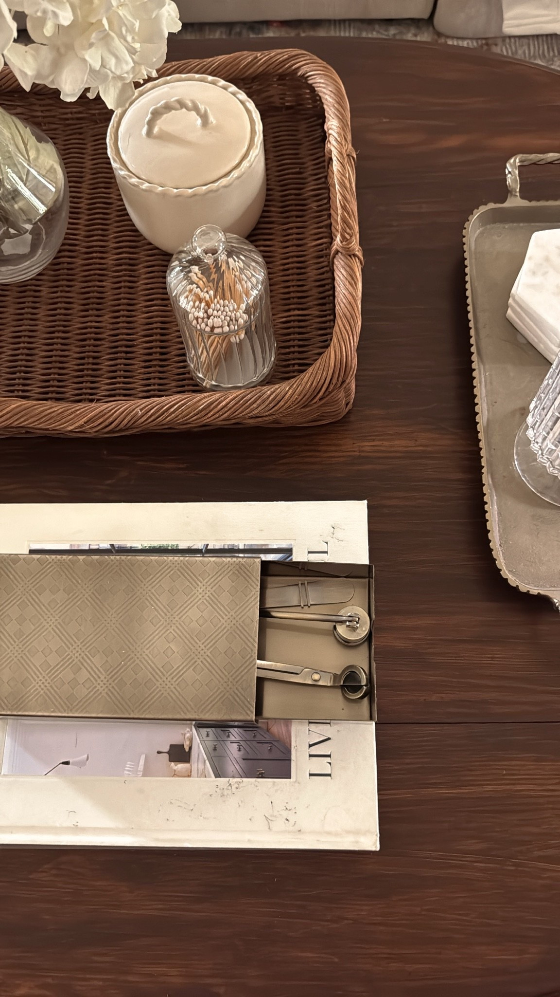 This brass candle accessory box from target is on sale right now! It looks like a brass box sitting on your coffee table, but it opens up to store all of your candle accessories, which it also comes with ￼

#LTKHome