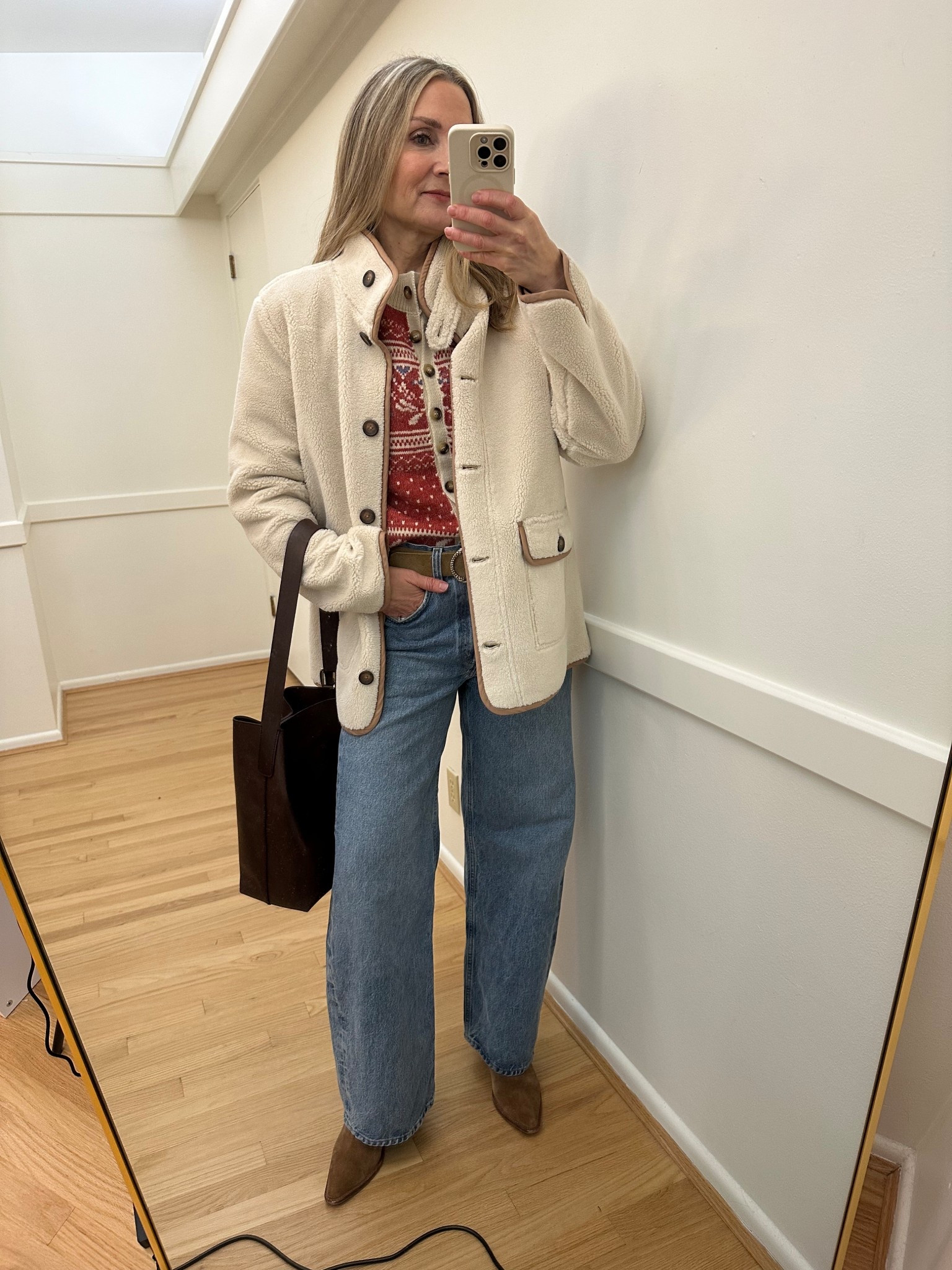 Winter outfit of the day! Heartloom patterned cardigan, agolde jeans, Sherpa fleece coat, madewell bucket bag

#LTKOver40 #LTKootd #LTKFindsUnder100