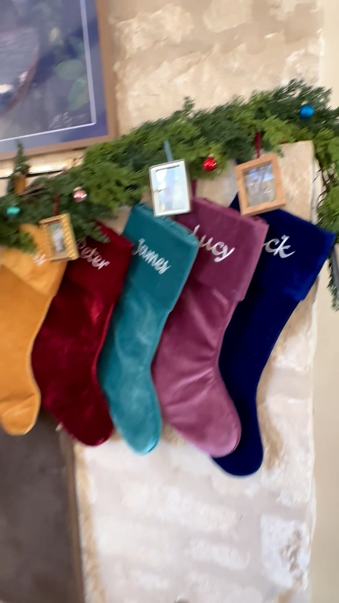 My favorite little corner during Christmas. Love these stockings that come in so many pretty colors to match any house. And my cutie little ornaments with all our past Christmas cards on them. Tis the season!

#LTKHome #LTKHoliday #LTKSeasonal