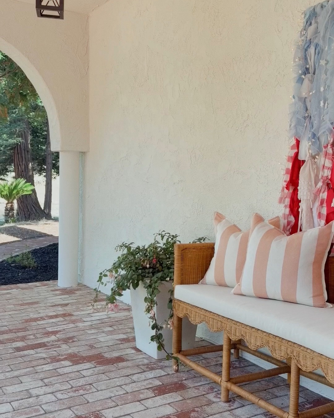 Nothing says summer like a cozy front porch dressed up for the Fourth. ✨ This scalloped bench might just be my favorite spot to sit. 🇺🇸❤️

#FourthOfJulyDecor #FrontPorchDecor #PatrioticDecor #SummerHome #CozyHome

#LTKHome #LTKSeasonal #LTKstorytime