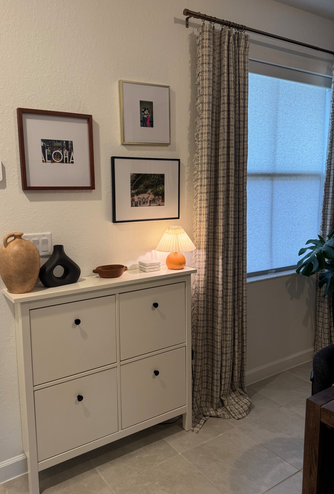 Our small space entryway ✨ trying to maximize our space while still keeping it minimal and cozy. This shoe cabinet helps us stay tidy and organized everyday while still looking cutie 😍



entryway decor | gallery wall | family pictures | shoe cabinet | entryway organization | shoe organization | gallery wall styling | mini lamps | cozy space | small space living | cozy home 
#LTKFindsUnder100 #LTKFindsUnder50

#LTKHome