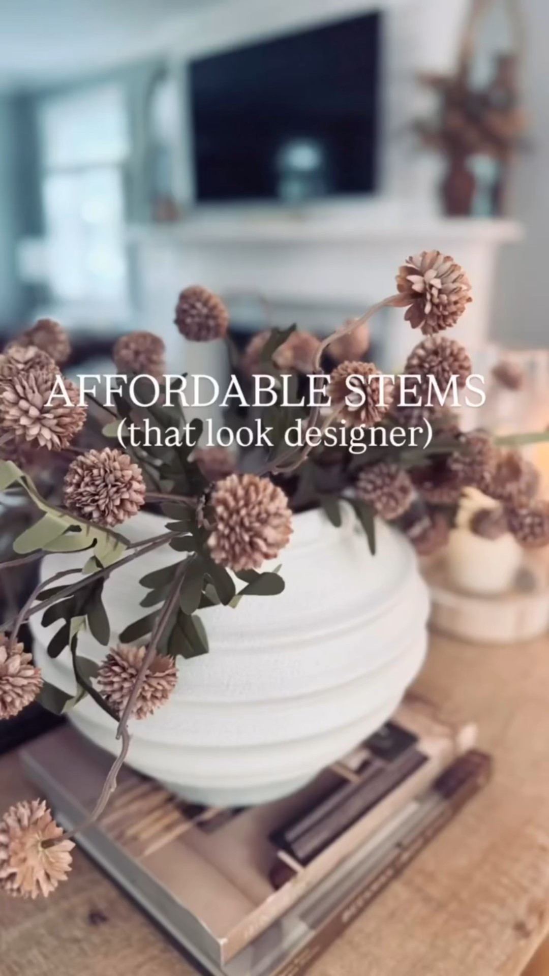 Another snowy weekend. Looks like I’ll just have to enjoy a snowy Saturday in my PJs with a good book. Should I simmer a pot of chicken soup or a beef stew? These are the only hard decisions I want to make today. Work has my brain spinning and I think Mother Nature knew I needed a day to just…be.  Check out the pics of my yard in today’s story. 

But rain, snow or shine these neutral Pom Pom stems are one of my favs for year-round use. You can style them droopy or full. I just ordered them in cream as well, and can’t wait to share them with you! I have a fun centerpiece in mind for them! 

Drop the word “stems” below and I’ll DM you links to everything featured on my sofa table. 

#facebookreels #florals #vase #tablestyling #cozyhome