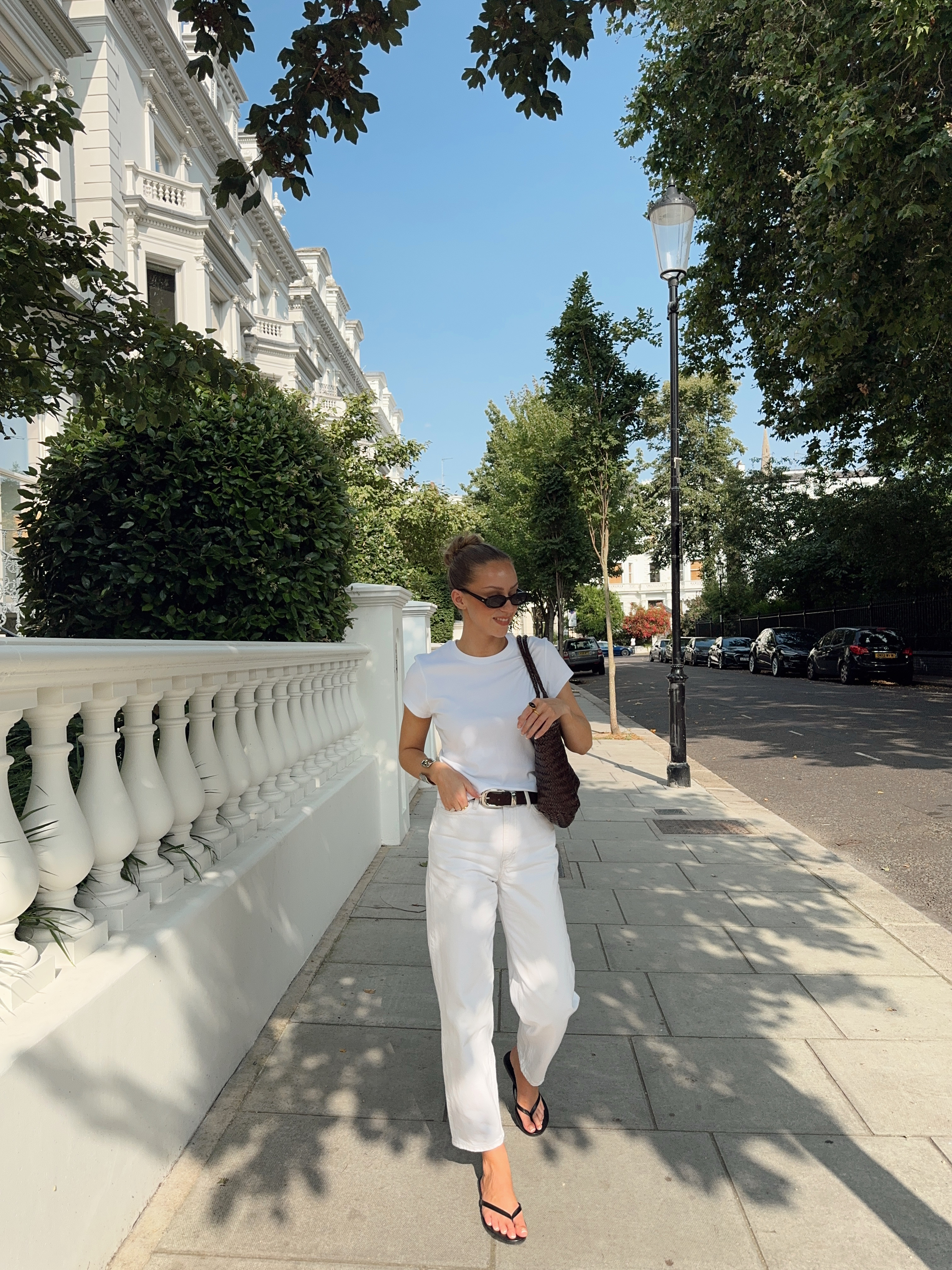 Ecru White Jeans, With T-shirt, Belt, Black Flip Flops, Black Sunglasses, Leather Braided Brown Bag, Uniqlo, Le Specs 

 #LTKuk #LTKspring #LTKstyletip