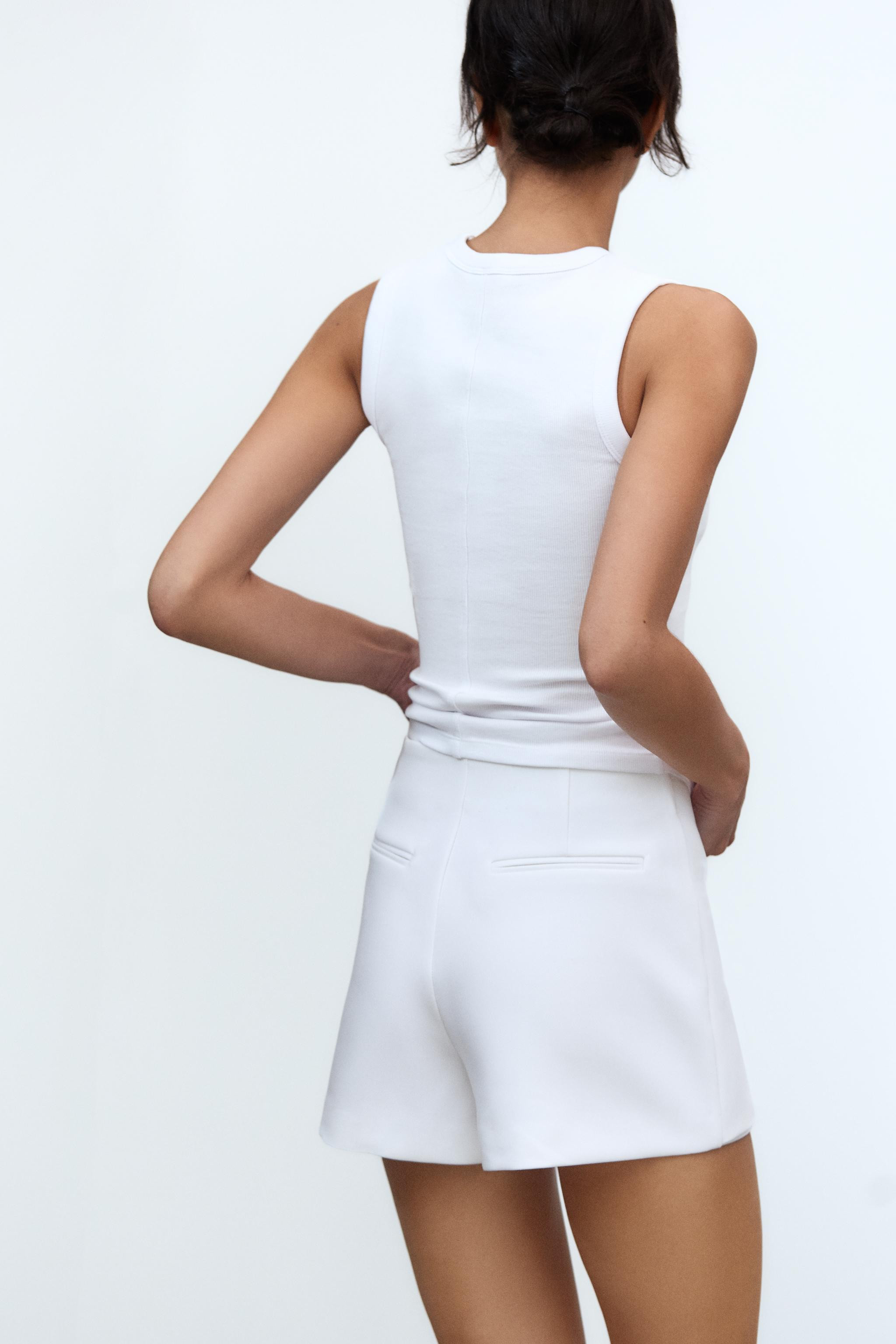 Skort with mid waist. False back welt pockets. Side hidden in-seam zip closure. | Zara US