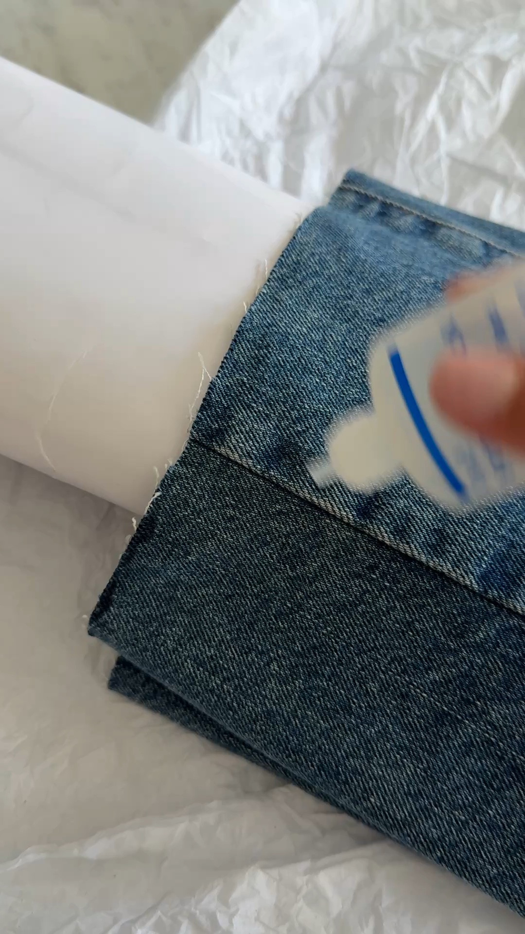 I use this on all of my raw cut jeans! And on any items that have started fraying or with threads coming undone.

It’s like a fabric glue so don’t use too much. You may need to reapply after multiple washes