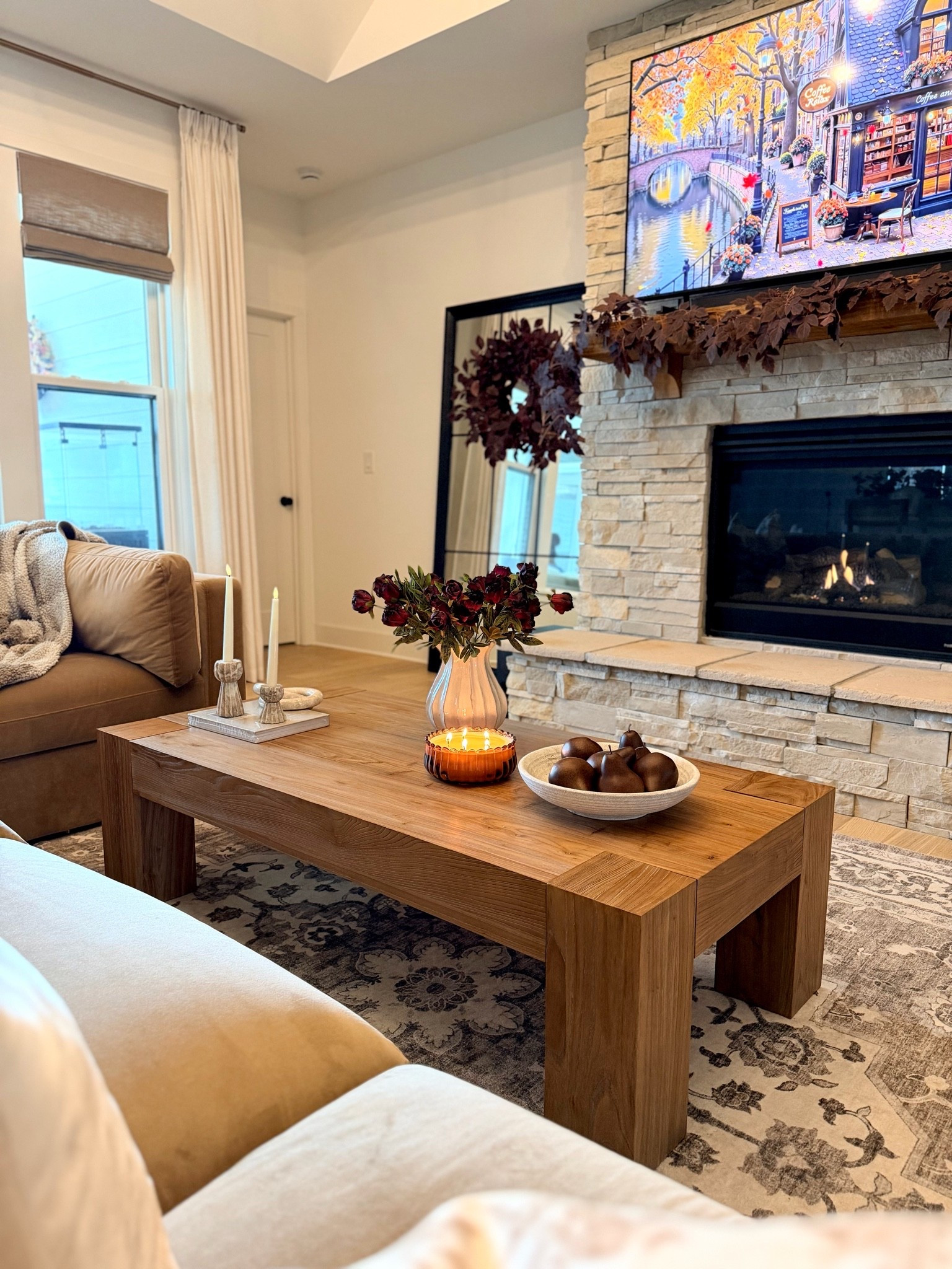 Cozy fall evenings just hit different. 🍂✨ Warm wood tones, a crackling fire, candlelight, and a few moody touches make this space feel like the perfect place to slow down and enjoy the season. 🤎

#LTKHome #LTKSeasonal #LTKdayinmylife